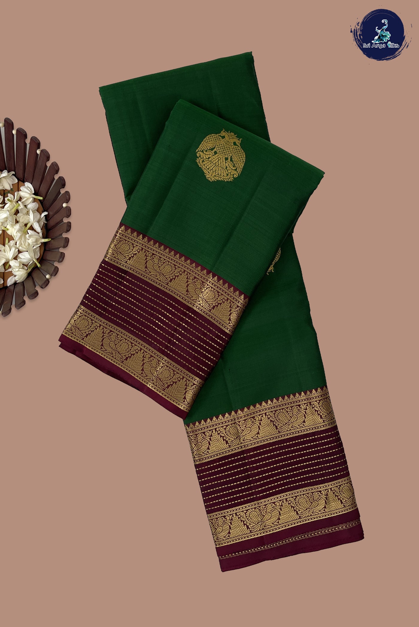Dark Green Traditional Silk Saree With Zari Buttas Pattern