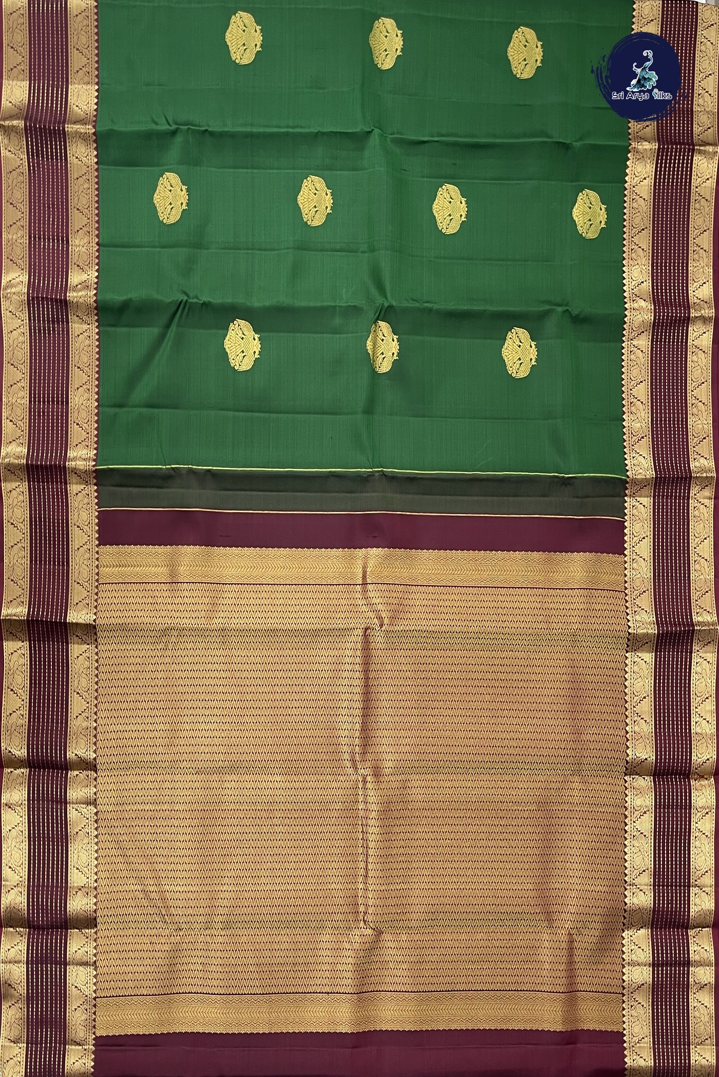 Dark Green Traditional Silk Saree With Zari Buttas Pattern