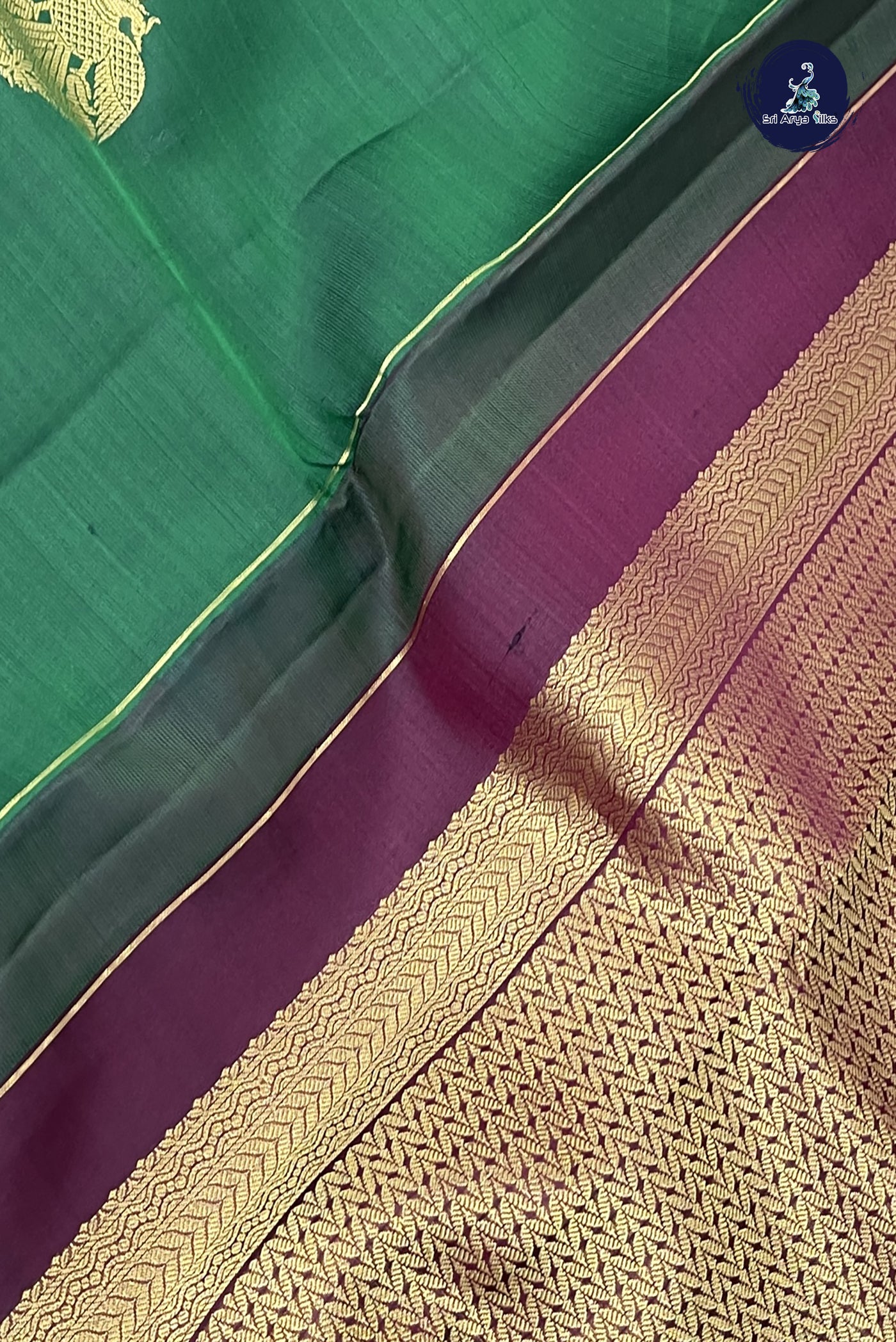 Dark Green Traditional Silk Saree With Zari Buttas Pattern