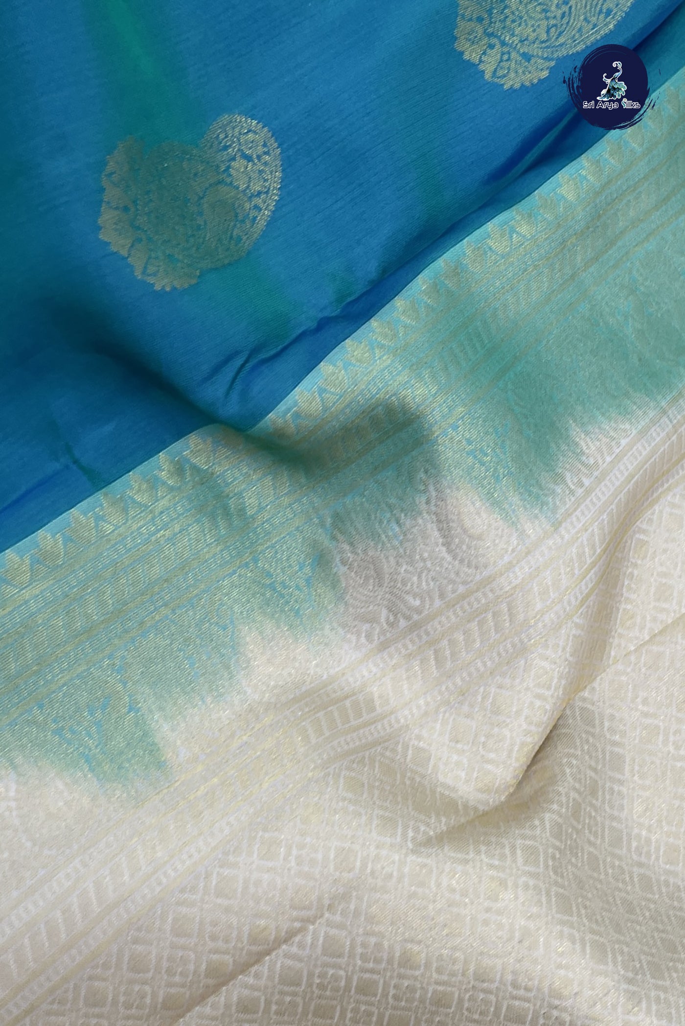 Teal Half Pure Silk Saree With Zari Buttas Pattern