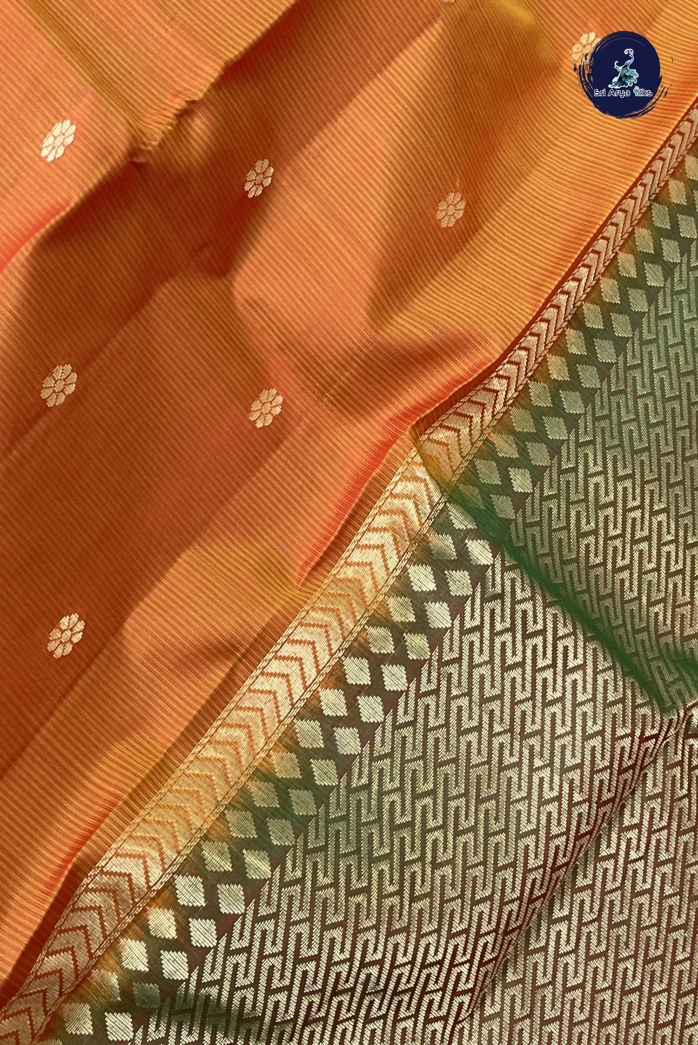 Lite Mustard Orange Light Weight Silk Saree With Zari Buttas Pattern