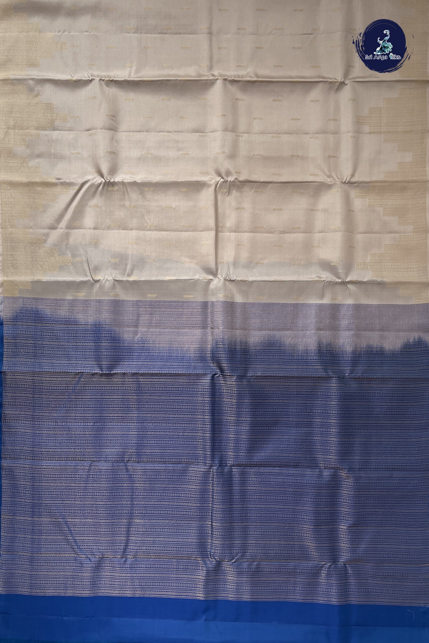 Ivory Half Pure Silk Saree With Zari Buttas Pattern