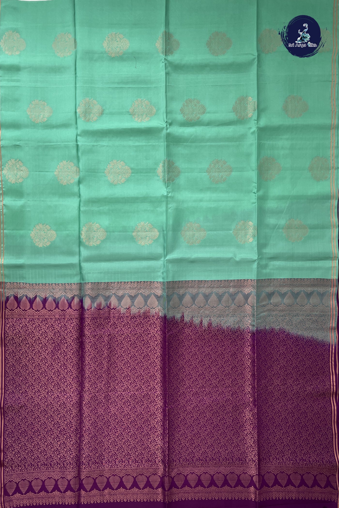 Pastel Green Half Pure Silk Saree With Zari Buttas Pattern