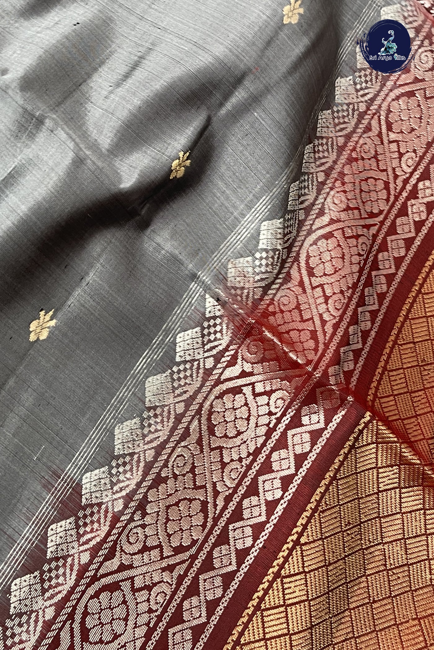 Grey Soft Silk Saree With Zari Buttas Pattern
