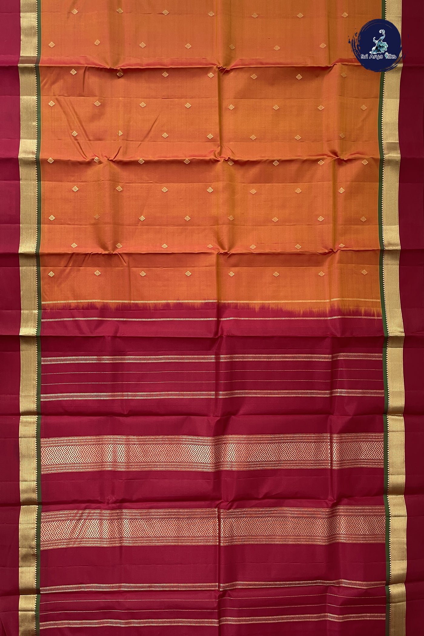 Lite Mustard Orange Light Weight Silk Saree With Zari Buttas Pattern