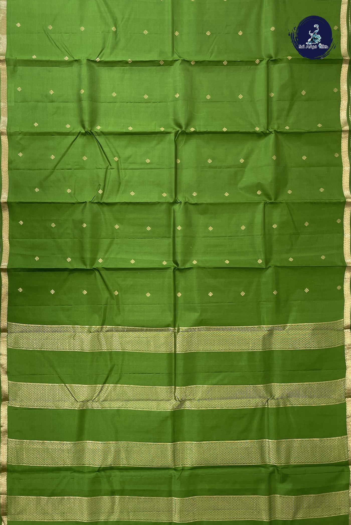 Green Light Weight Silk Saree With Zari Buttas Pattern