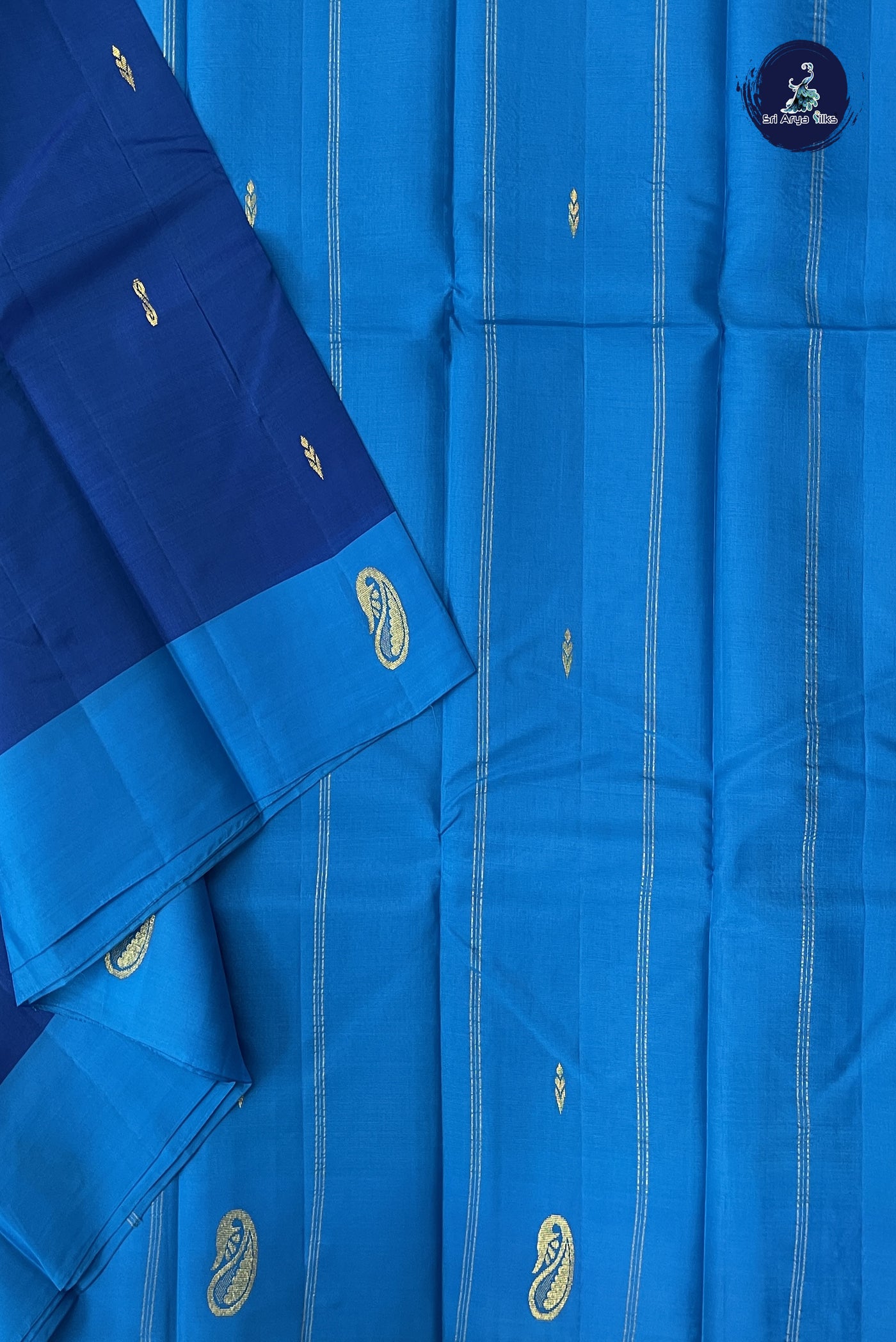 Peacock Blue Light Weight Silk Saree With Zari Buttas Pattern