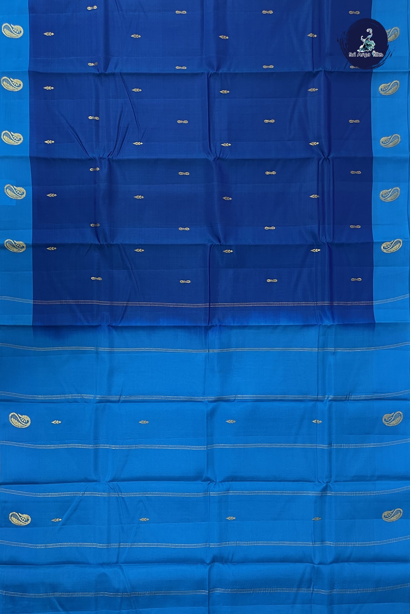 Peacock Blue Light Weight Silk Saree With Zari Buttas Pattern