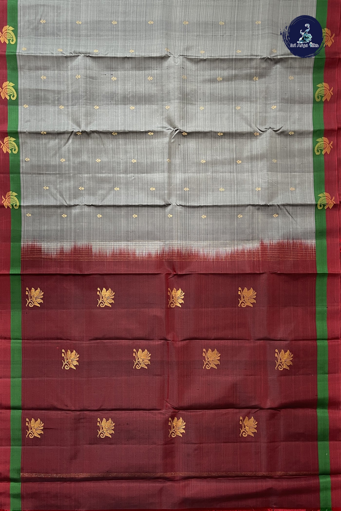 Grey Light Weight Silk Saree With Zari Buttas Pattern