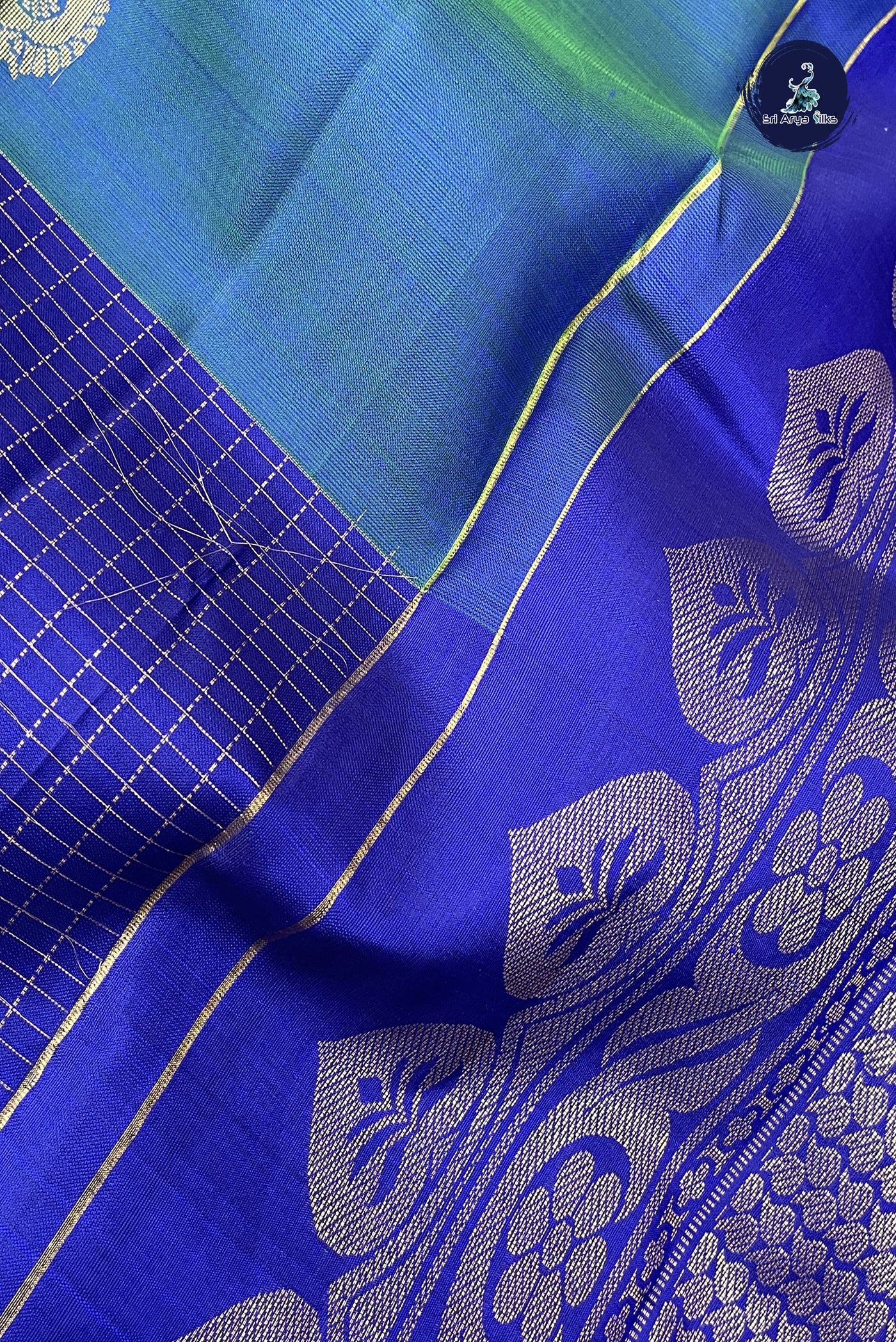 Peacock Blue Half and Half Checked Silk Saree With Zari Checked Pattern