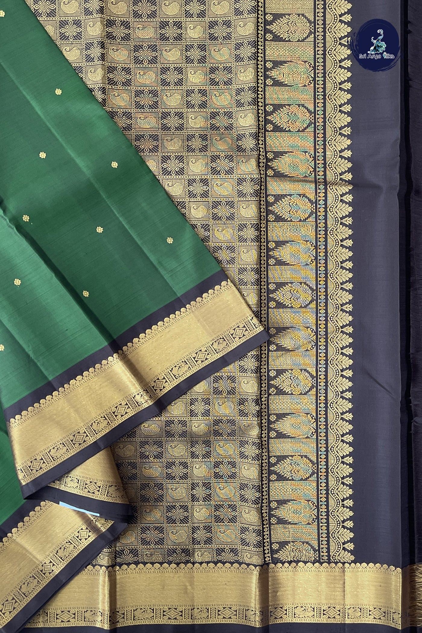 Dark Green Traditional Silk Saree With Zari Buttas Pattern