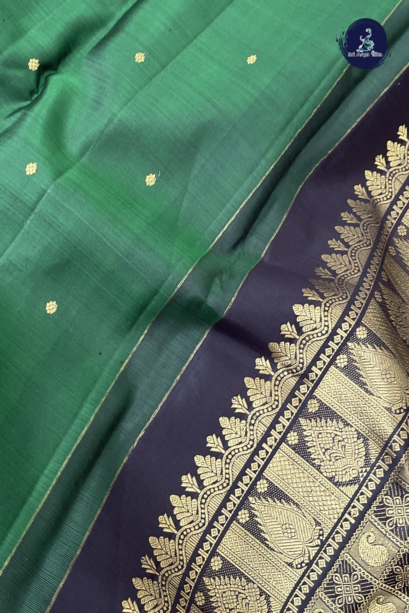 Dark Green Traditional Silk Saree With Zari Buttas Pattern