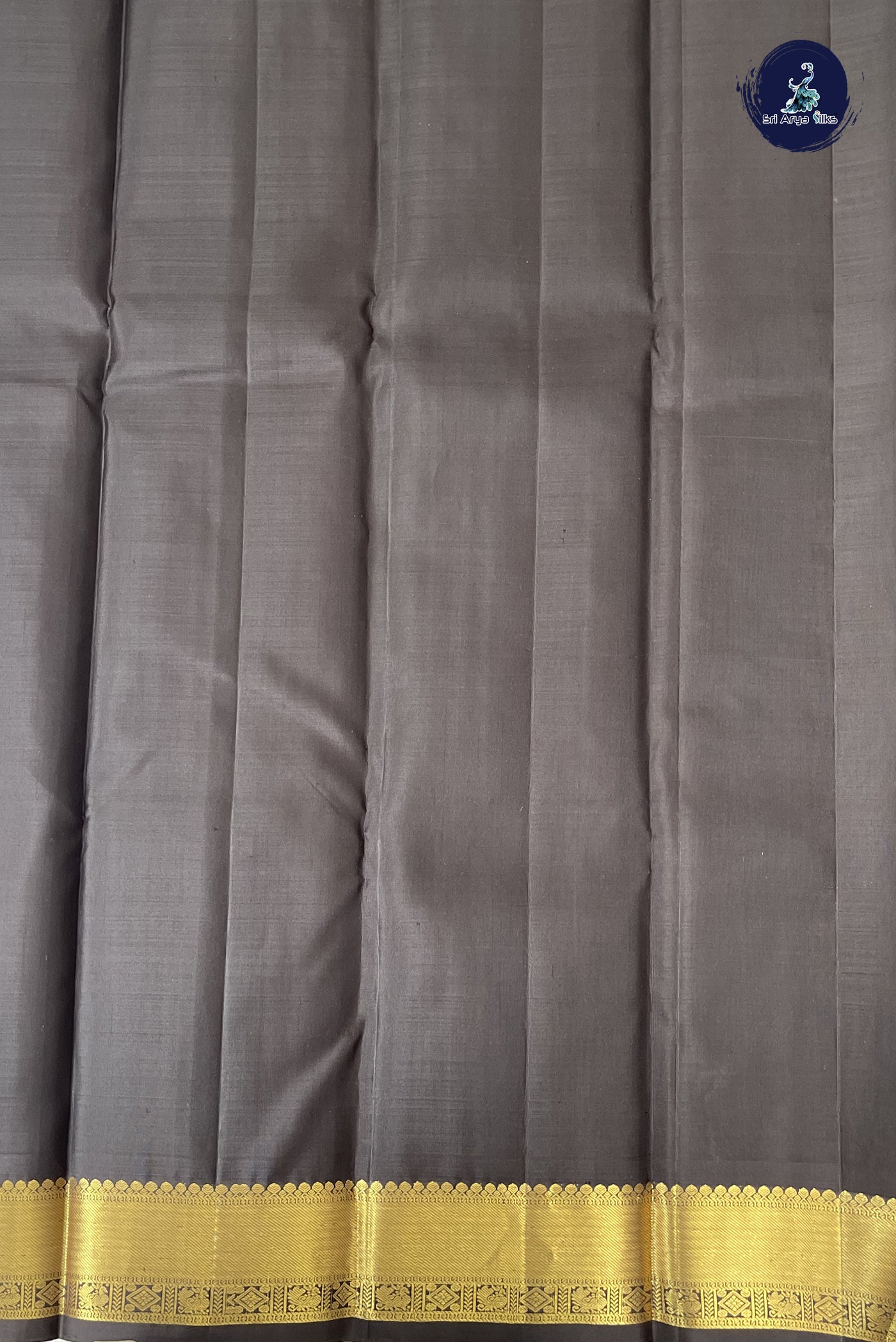 Dark Green Traditional Silk Saree With Zari Buttas Pattern