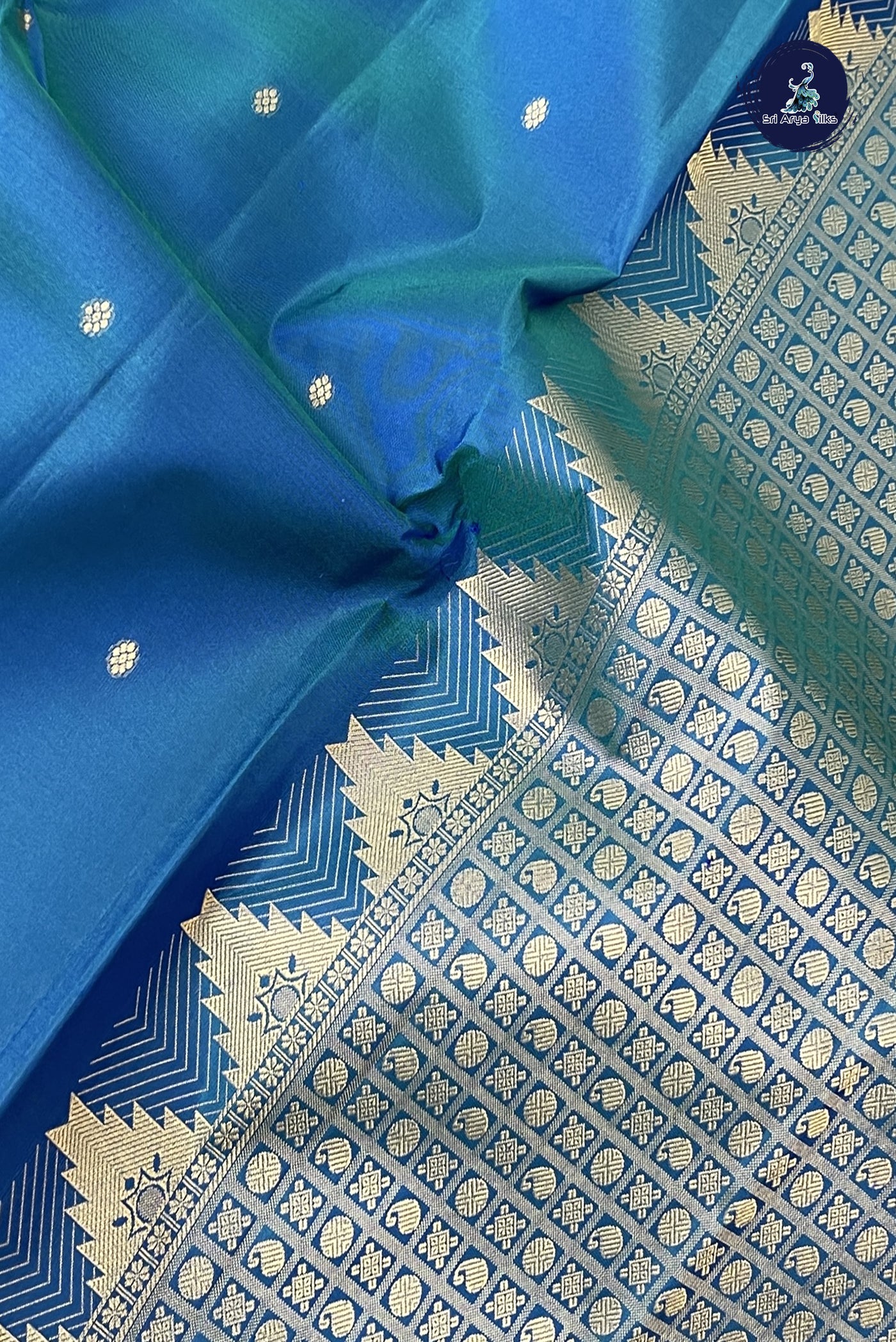 Peacock Blue Traditional Silk Saree With Zari Buttas Pattern