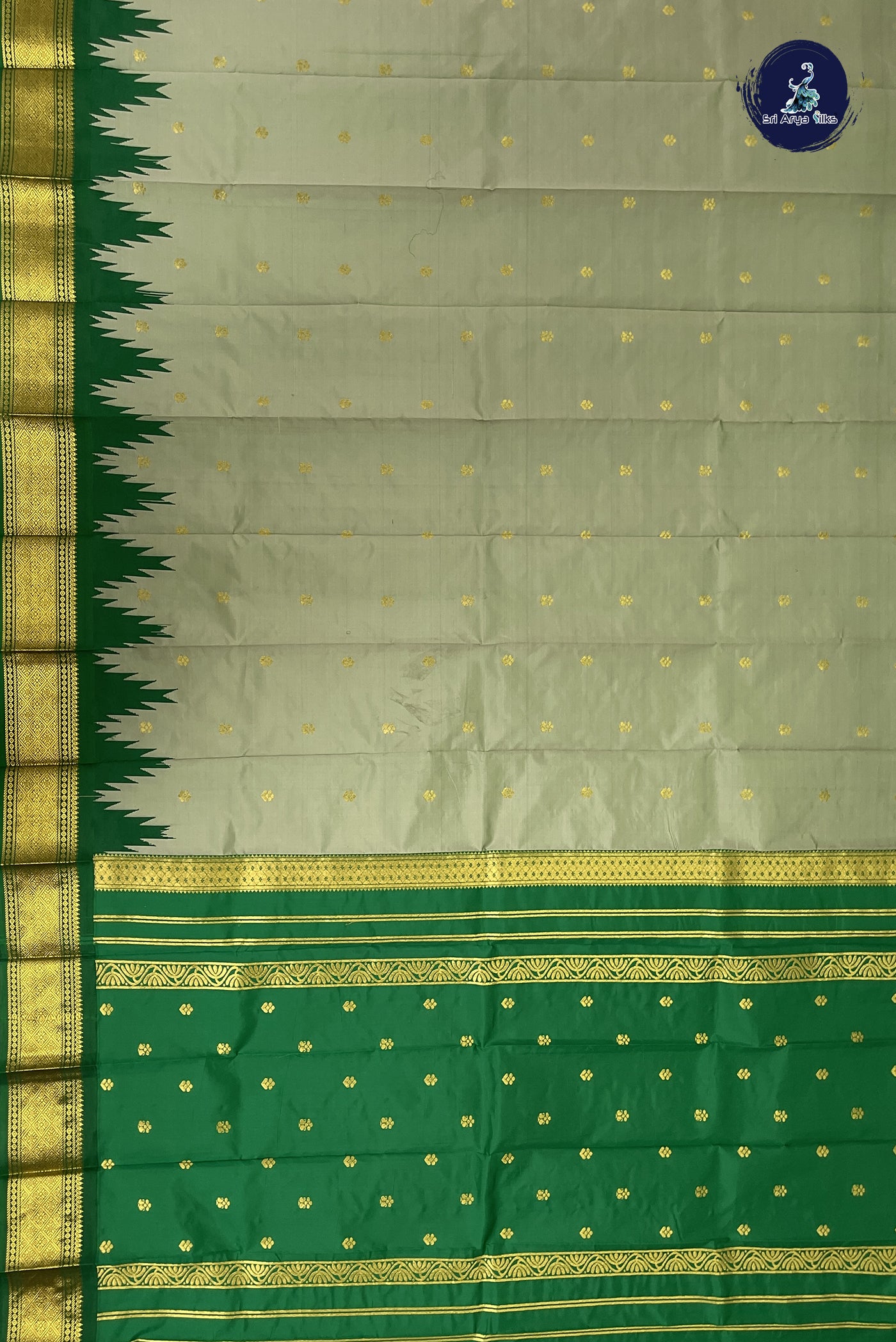 Pastel Green Half Pure Silk Saree With Zari Buttas Pattern