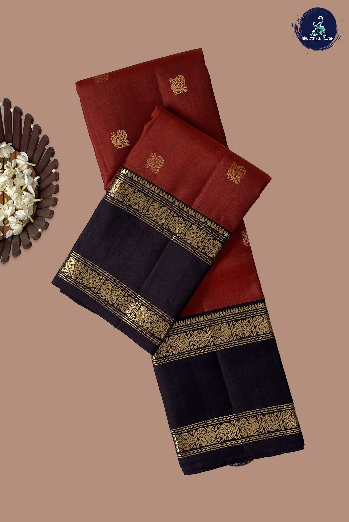 Rust Traditional Silk Saree With Zari Buttas Pattern