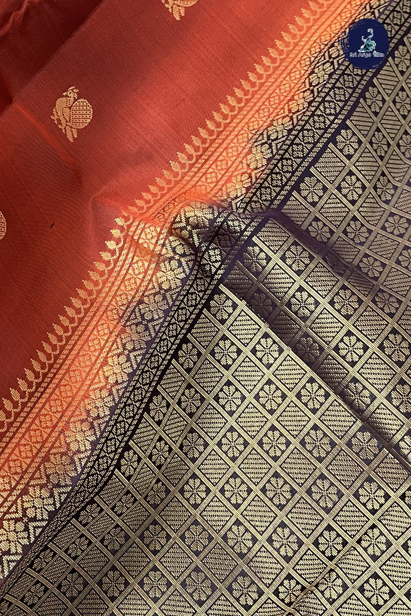 Rust Traditional Silk Saree With Zari Buttas Pattern