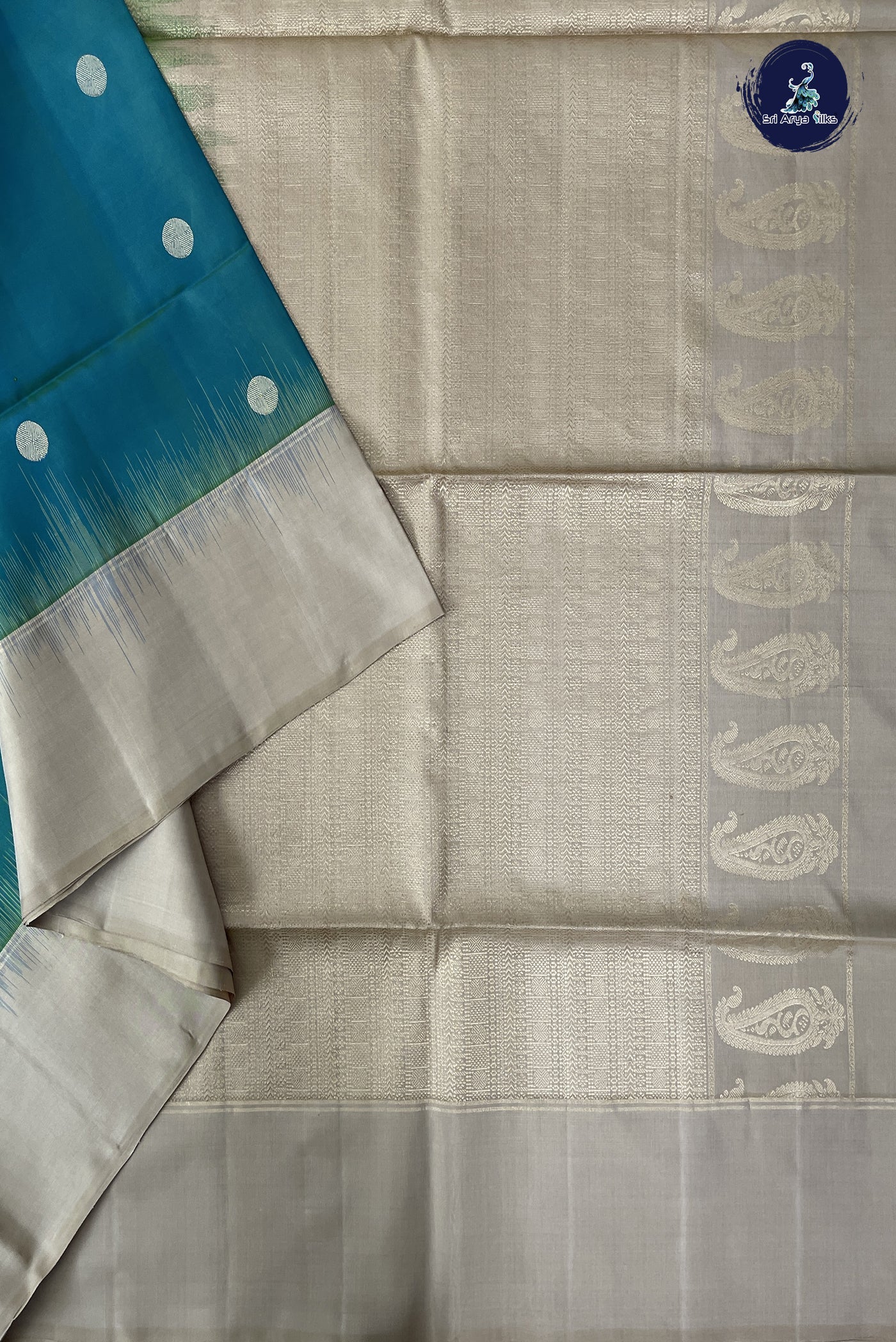 Greenish Blue Soft Silk Saree With Zari Buttas Pattern