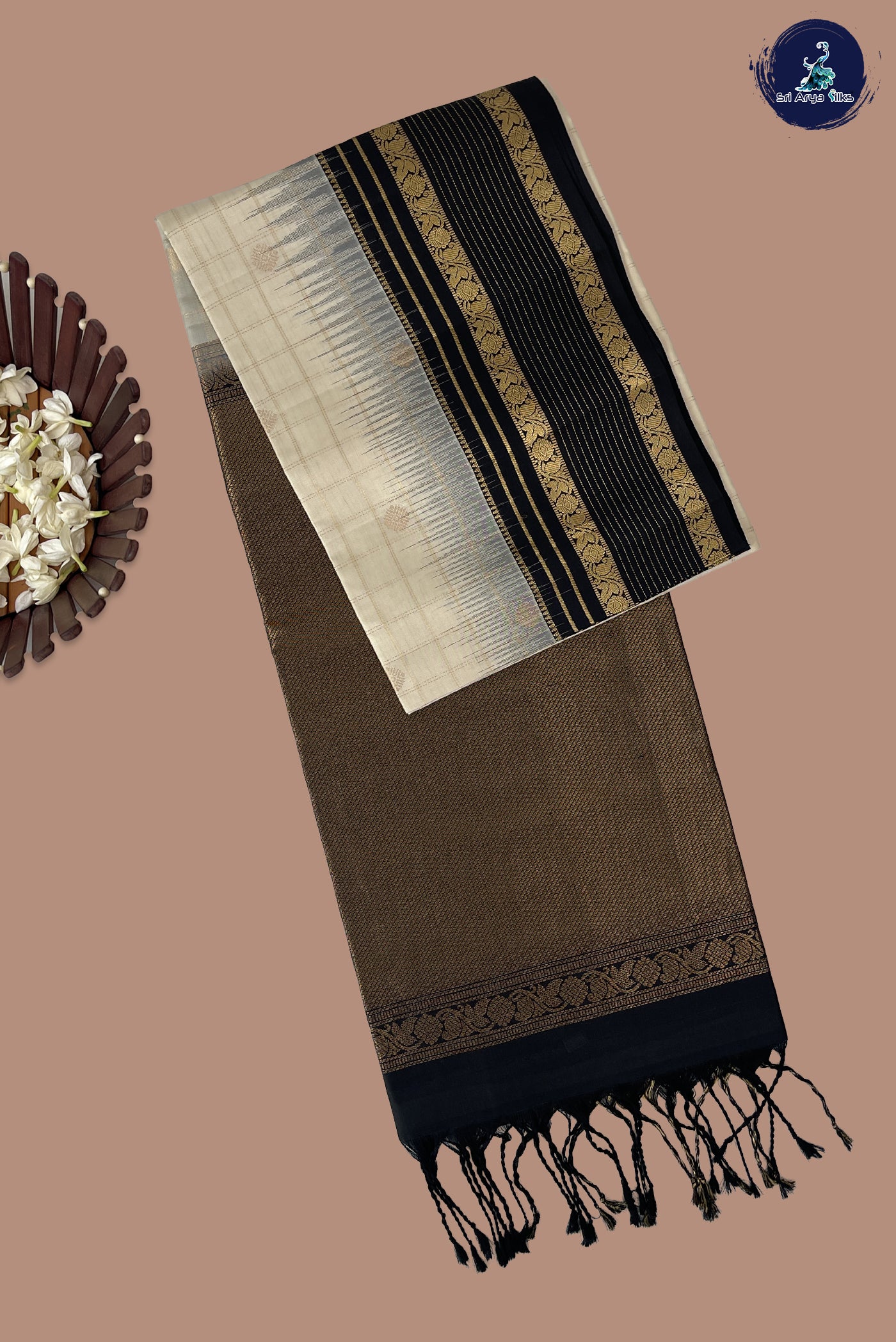 Off White Soft Silk Saree With Zari Buttas Pattern