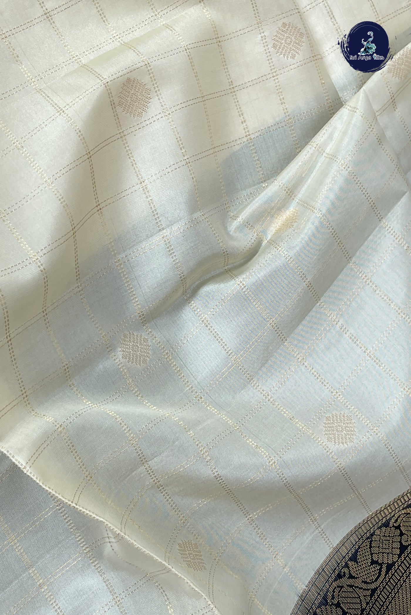 Off White Soft Silk Saree With Zari Buttas Pattern