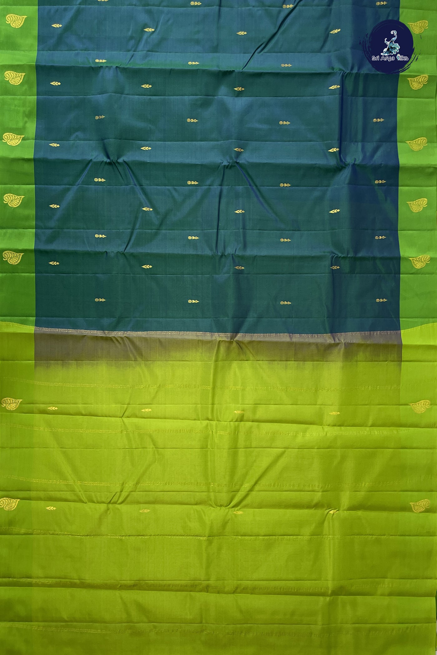 Bluish Green Light Weight Silk Saree With Zari Buttas Pattern