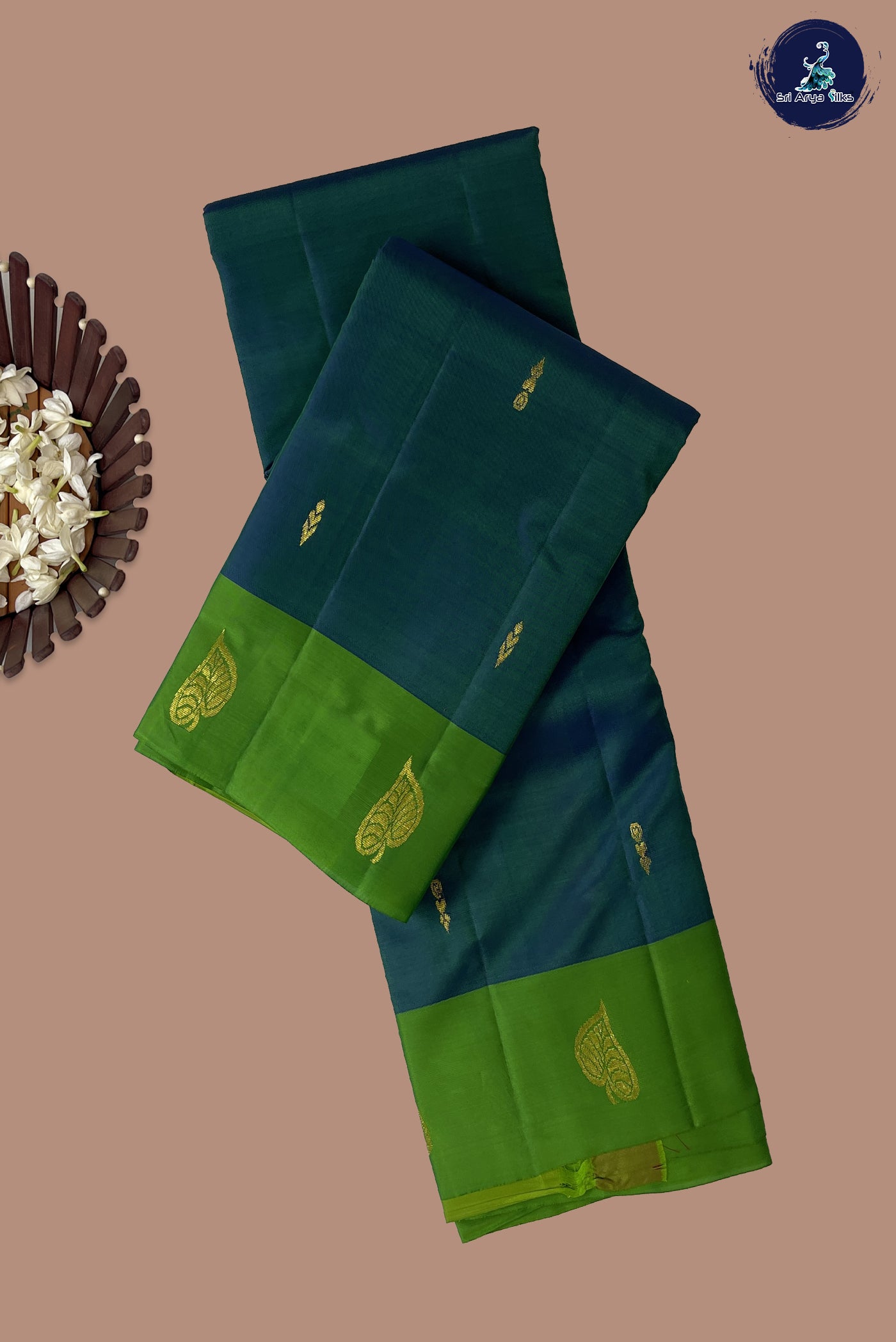 Bluish Green Light Weight Silk Saree With Zari Buttas Pattern