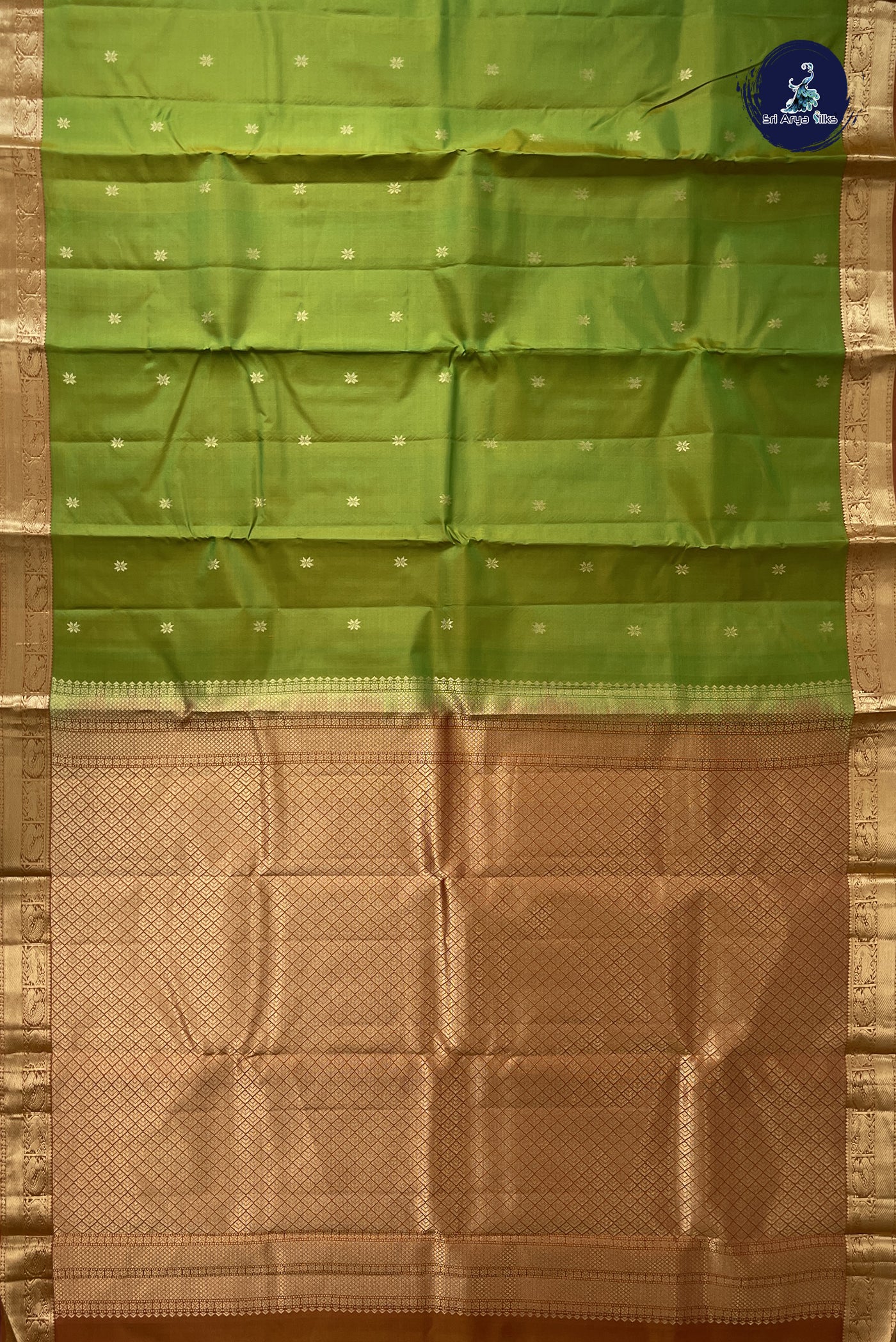 Lime Green Light Weight Silk Saree With Zari Buttas Pattern