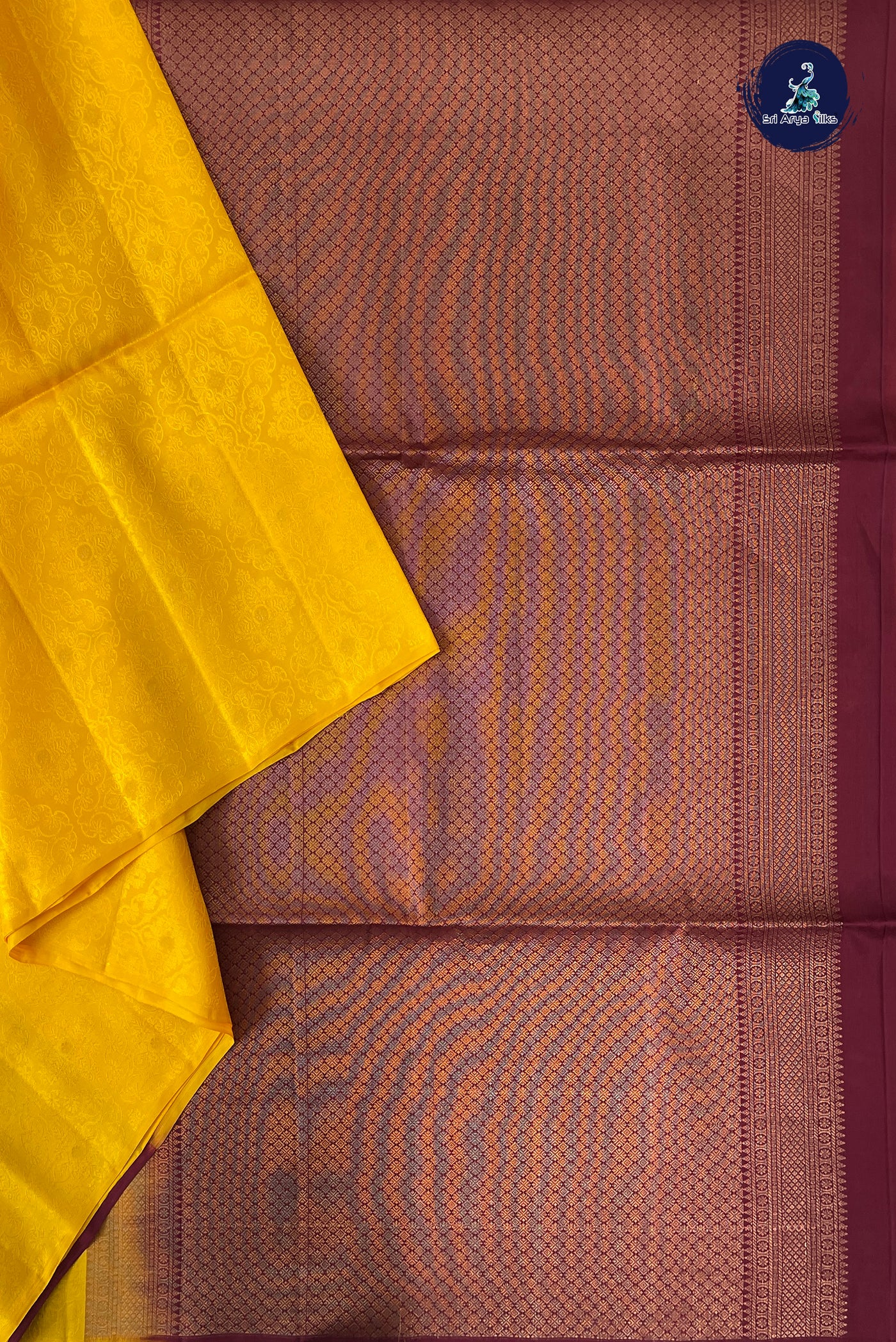 Yellow Half Pure Silk Saree With Embossed Pattern