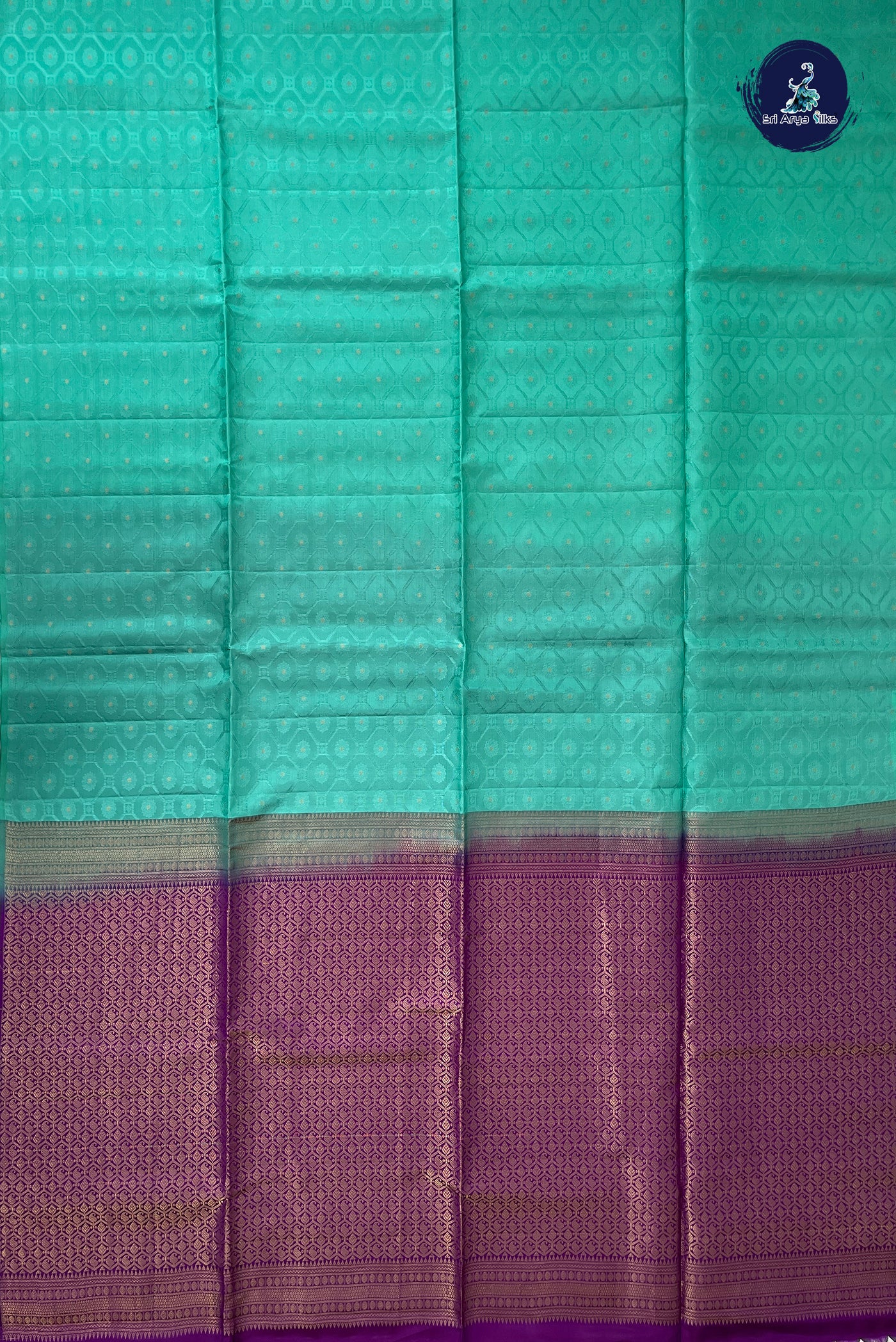 Teal Blue Half Pure Silk Saree With Embossed Pattern