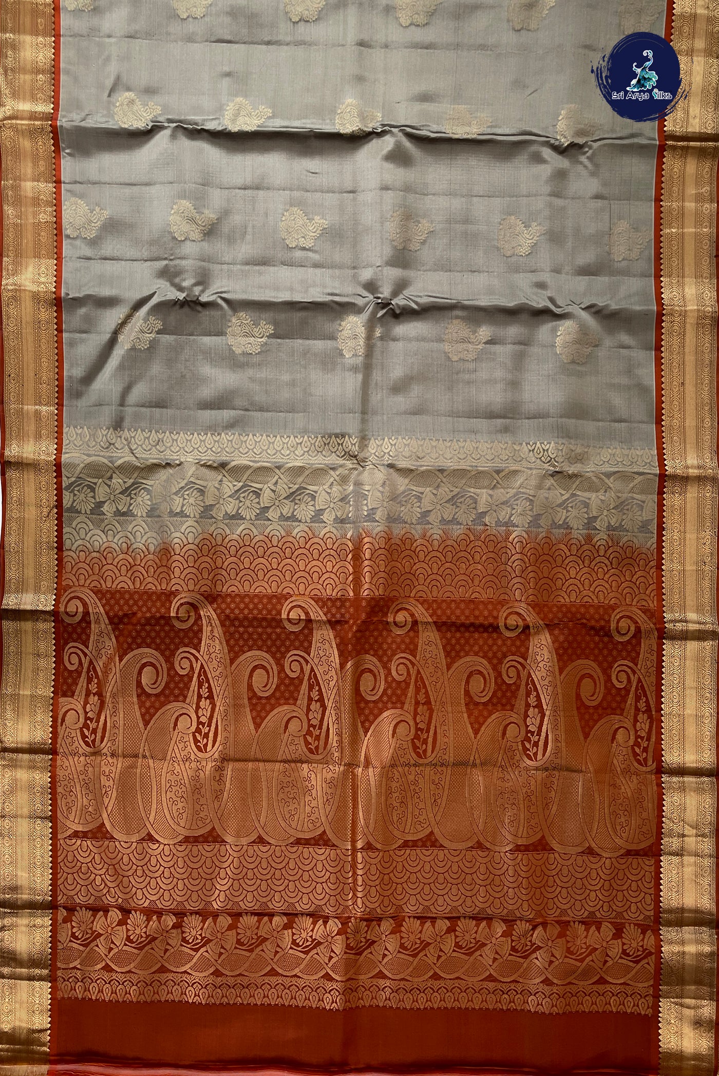 Grey Half Pure Silk Saree With Zari Buttas Pattern