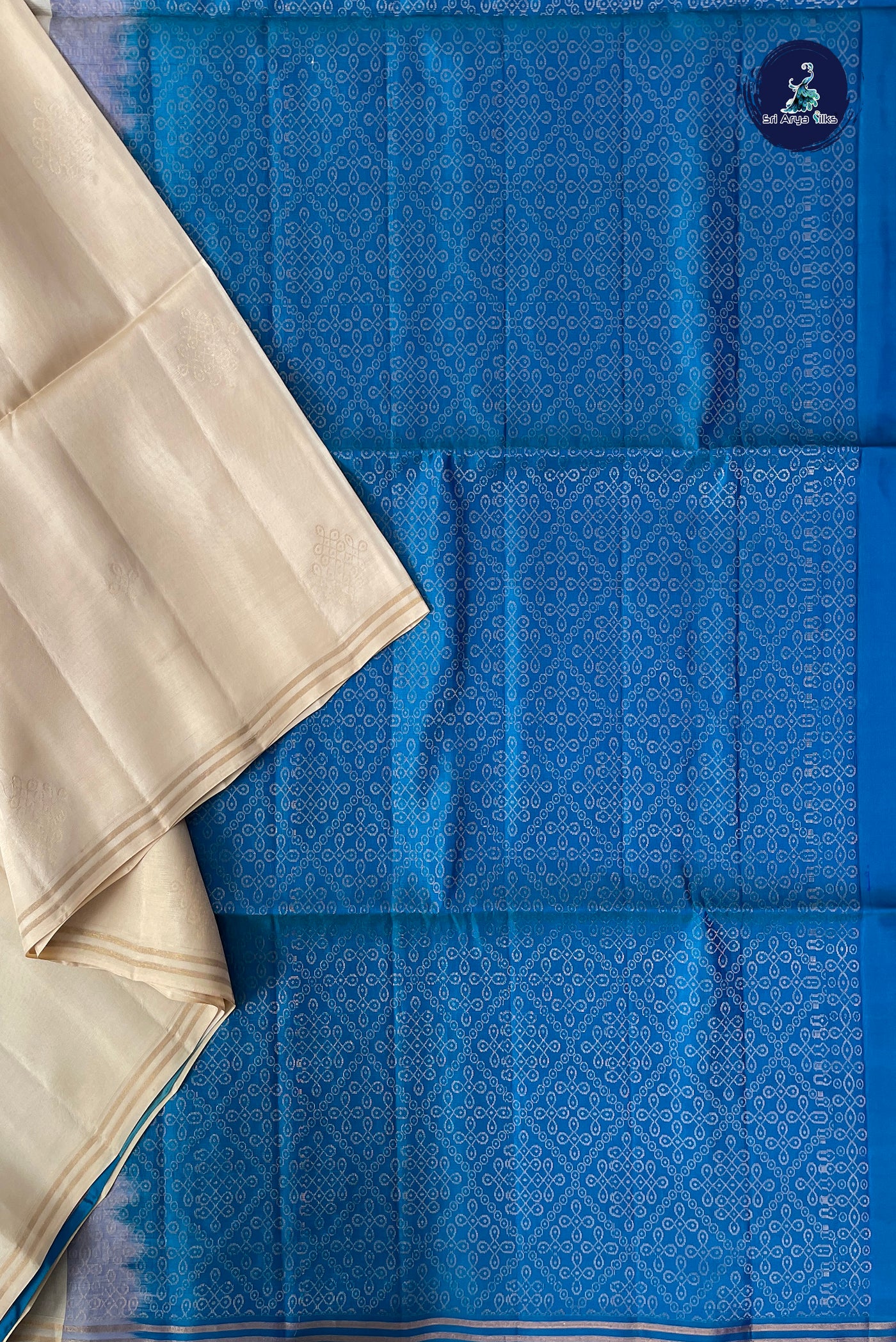 Cream Half Pure Silk Saree With Kolam Butta Pattern