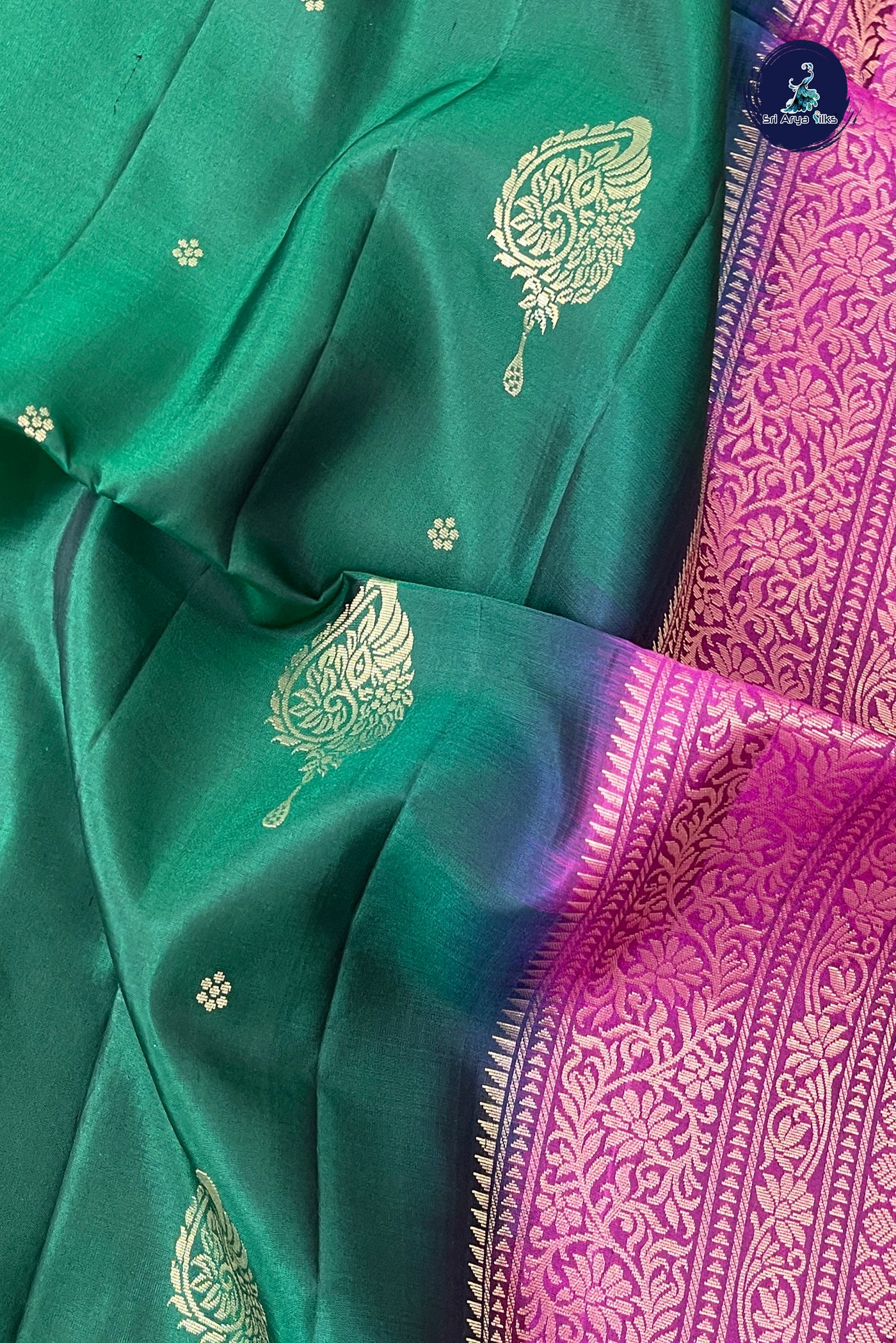 Bottle Green Soft Silk Saree With Zari Buttas Pattern