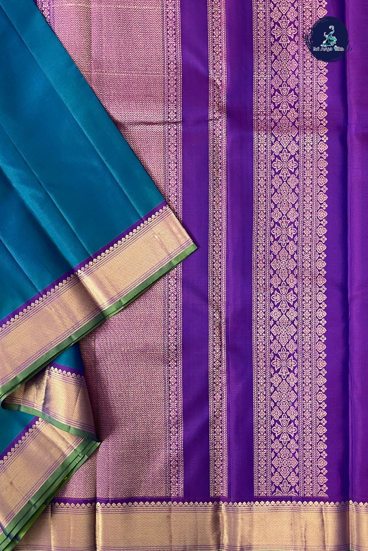 Peacock Blue Light Weight Silk Saree With Plain Pattern