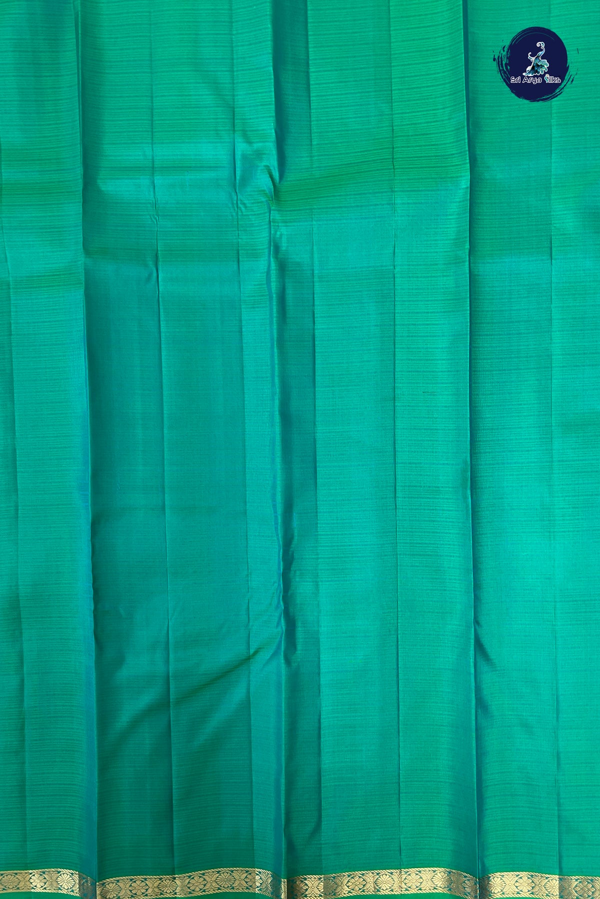 Bluish Green Rettaippade Border Silk Saree With Doria Lines Pattern