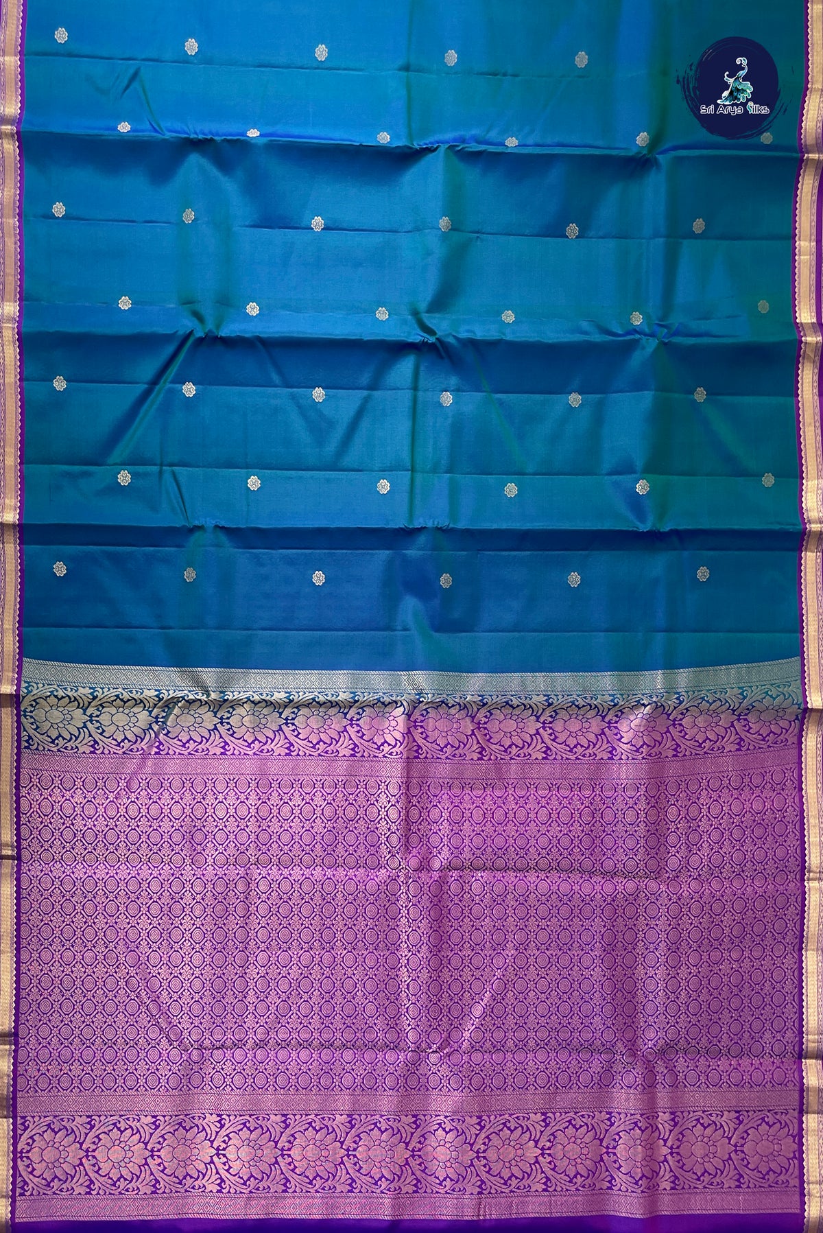 Peacock Blue Traditional Silk Saree With Zari Buttas Pattern
