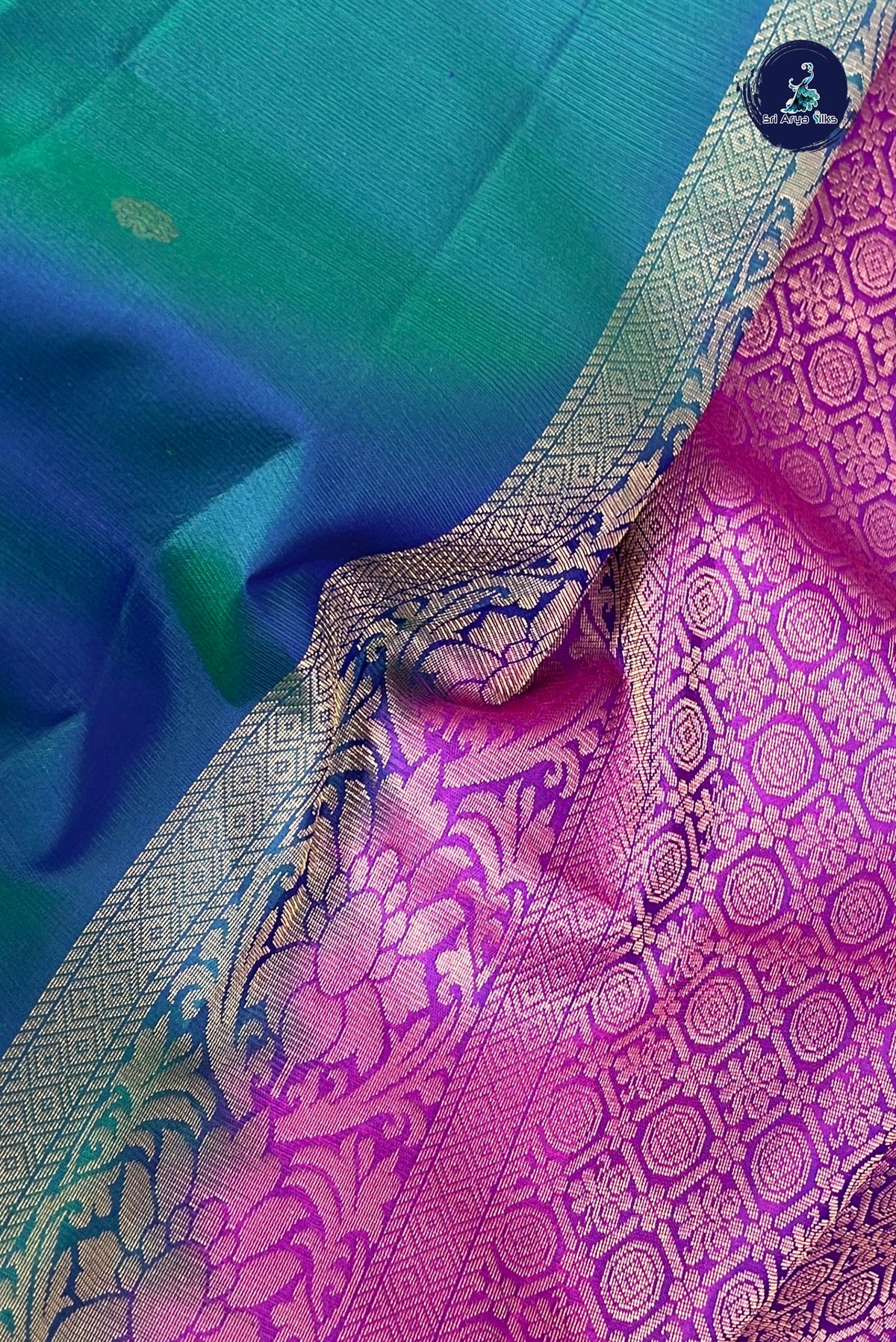 Peacock Blue Traditional Silk Saree With Zari Buttas Pattern