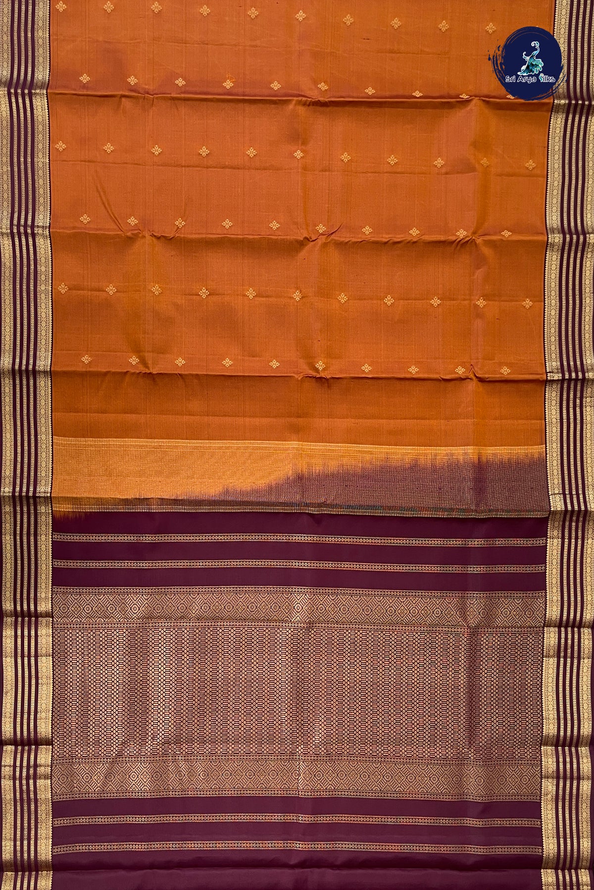 Rust Traditional Silk Saree With Zari Buttas Pattern