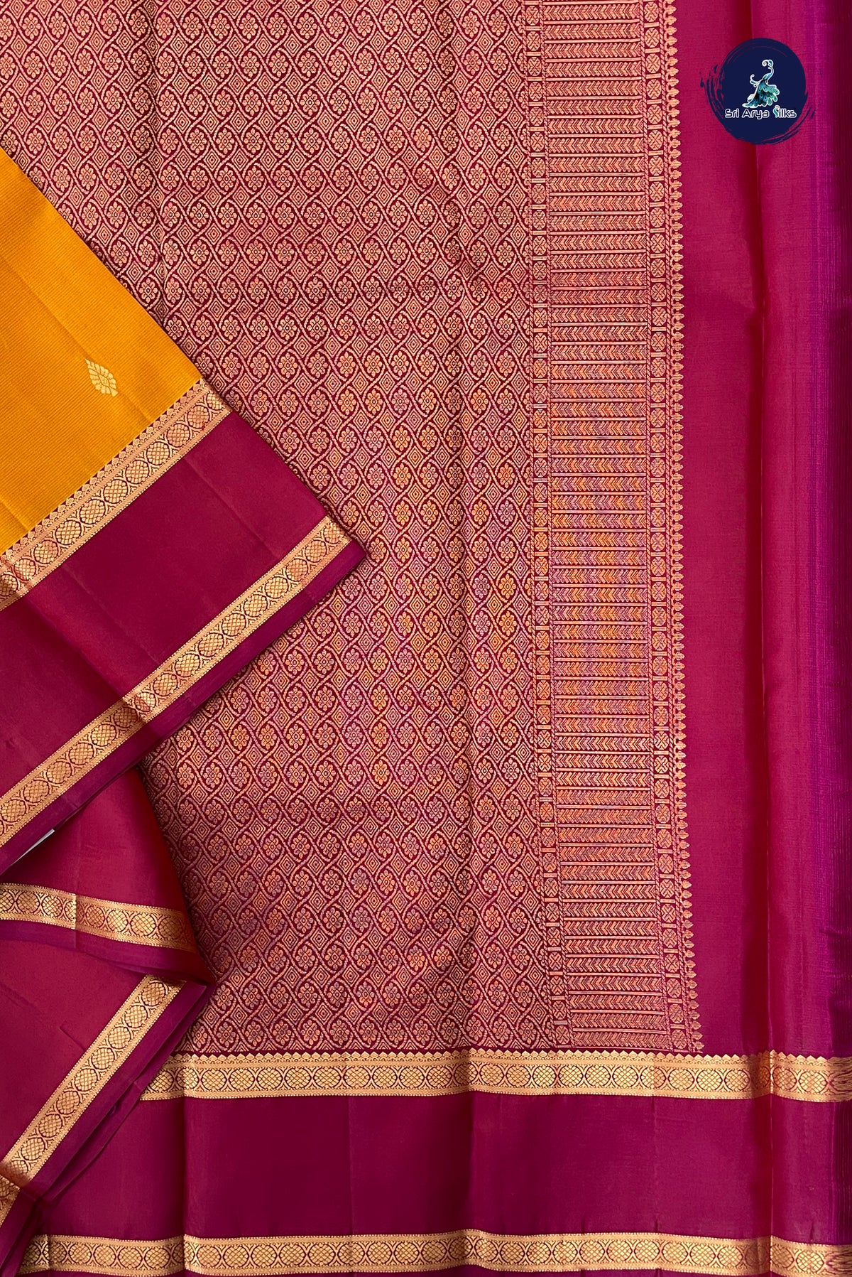 Lite Mustard Orange Rettaippade Border Silk Saree With Zari Buttas Pattern