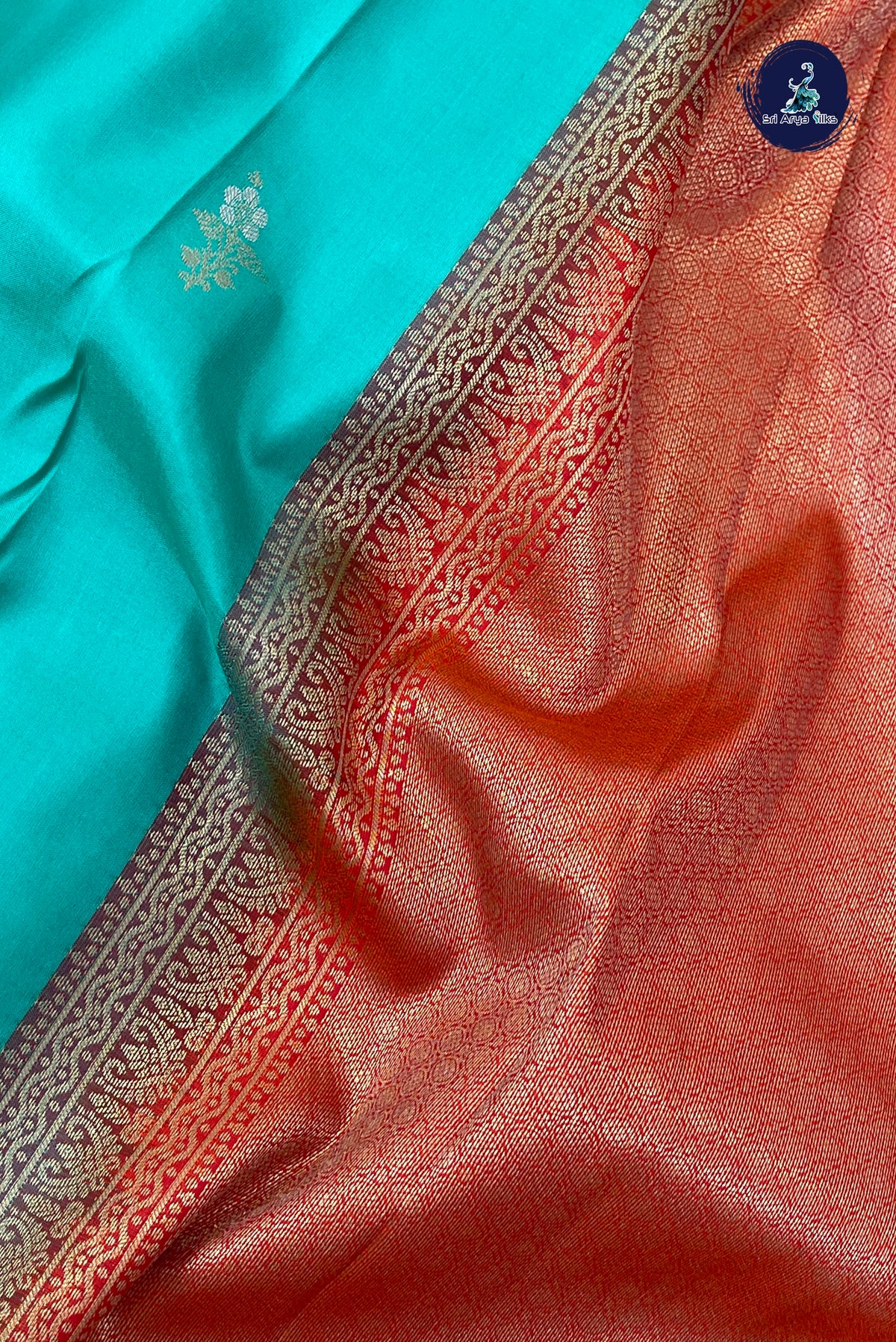 Turquoise Traditional Silk Saree With Zari Buttas Pattern
