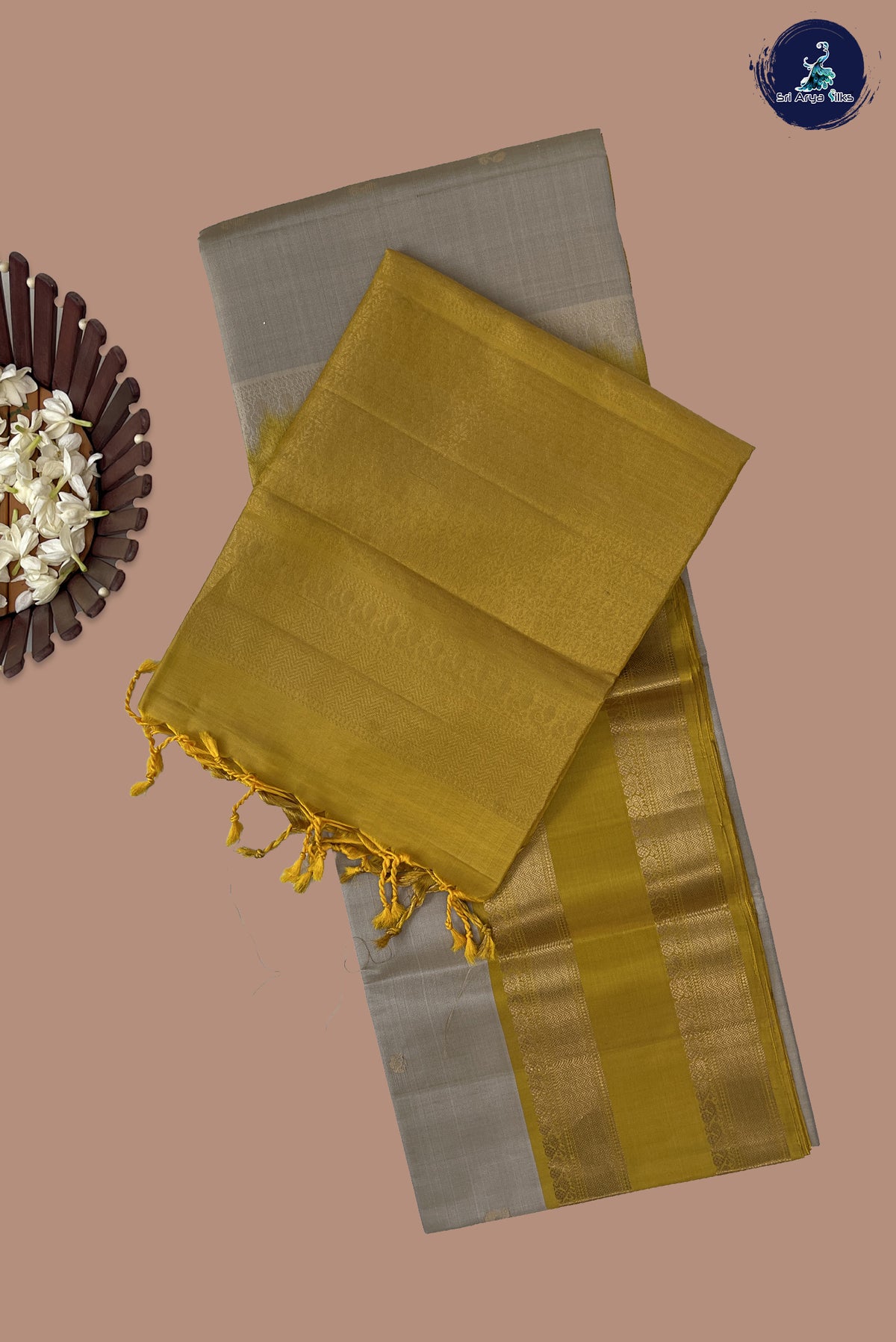 Beige Soft Silk Saree With Zari Buttas Pattern