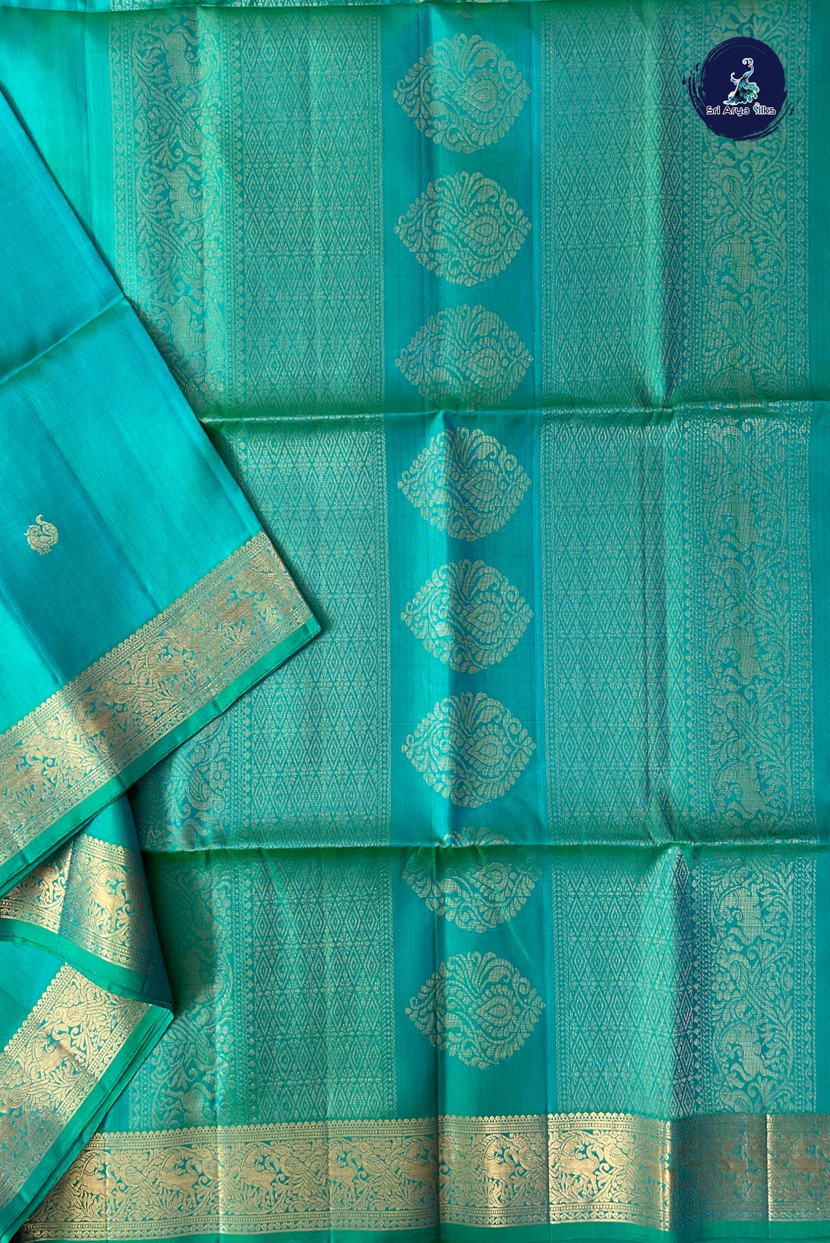 Bluish Green Soft Silk Saree With Zari Buttas Pattern