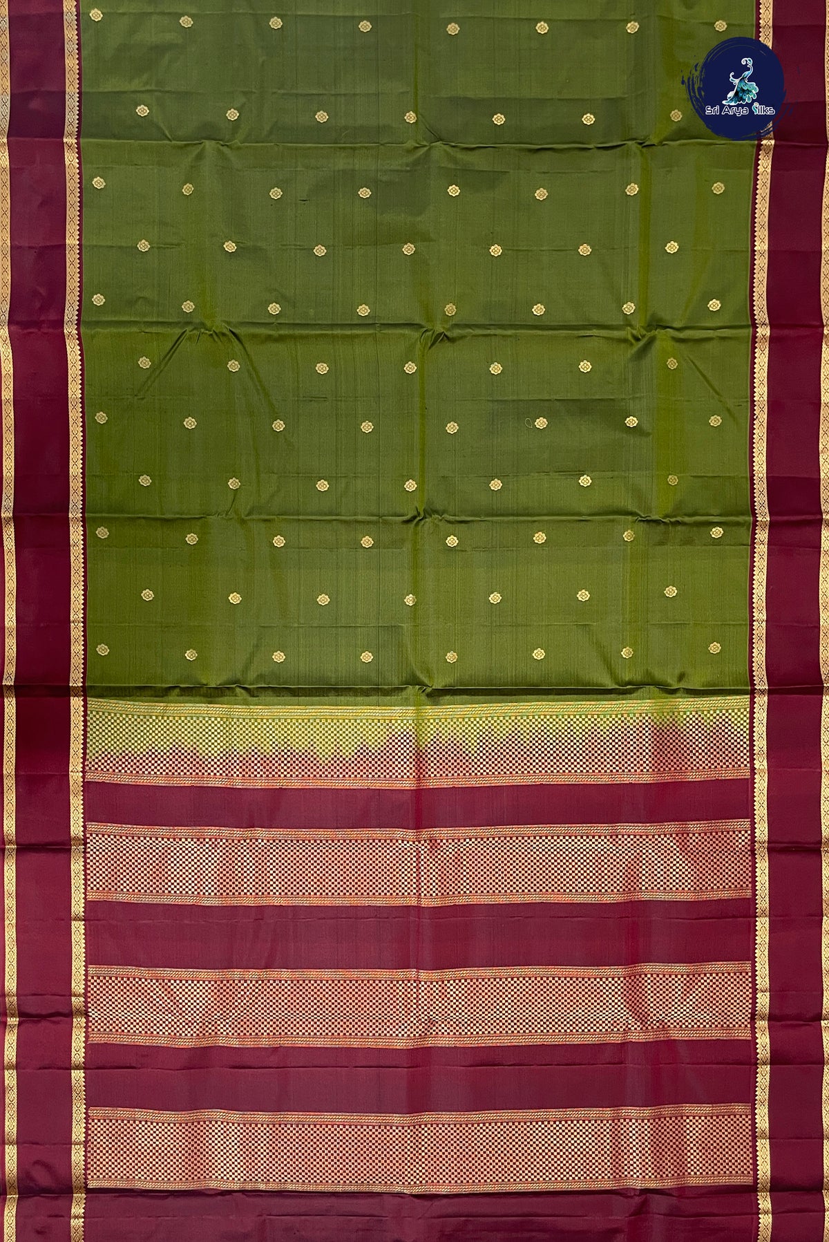 Green Light Weight Silk Saree With Zari Buttas Pattern
