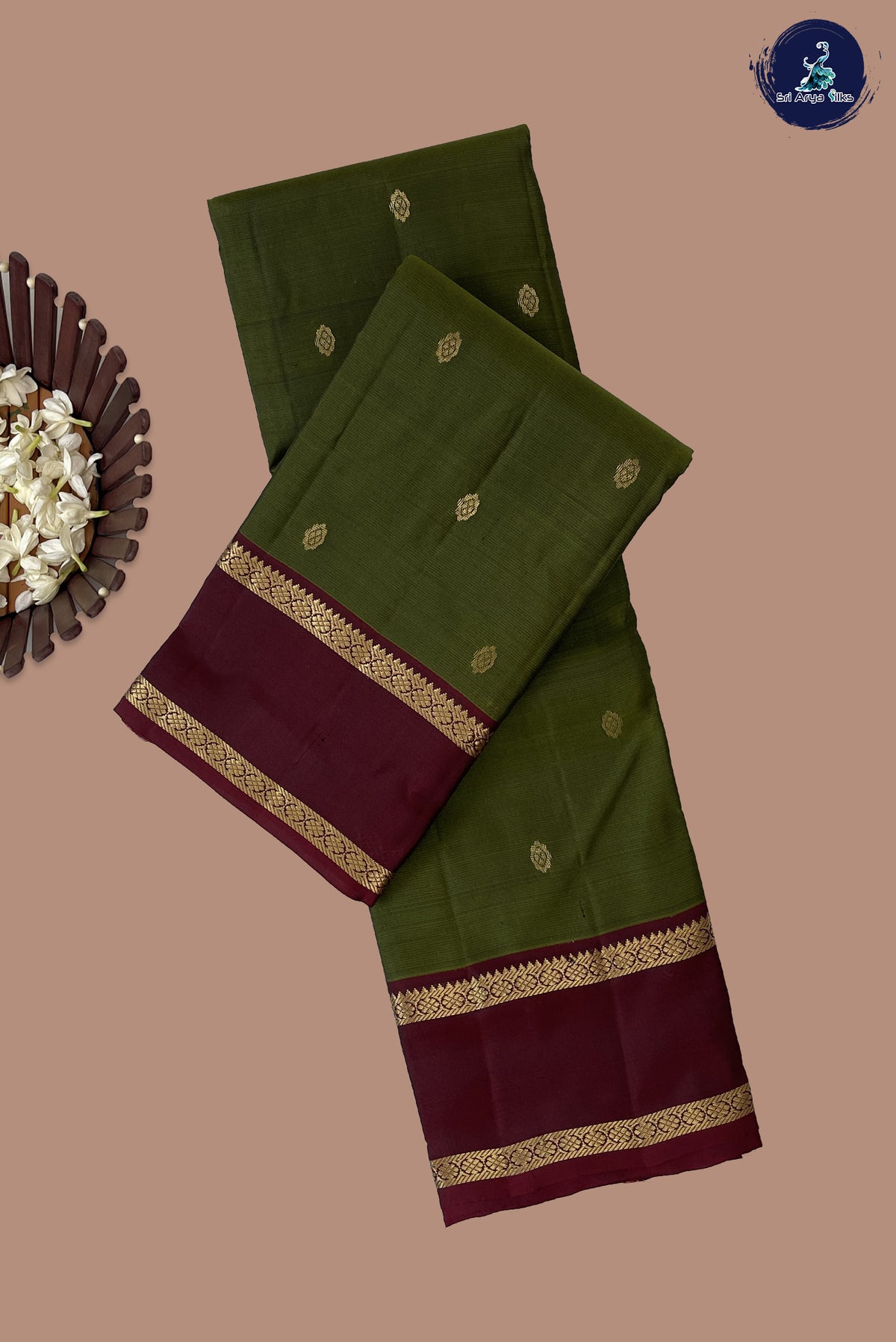 Green Light Weight Silk Saree With Zari Buttas Pattern