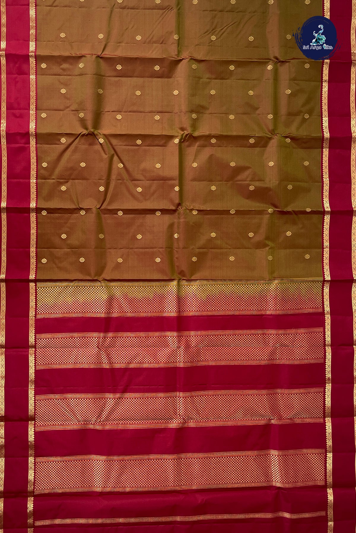 Dual Tone Mehendi Green Light Weight Silk Saree With Zari Buttas Pattern
