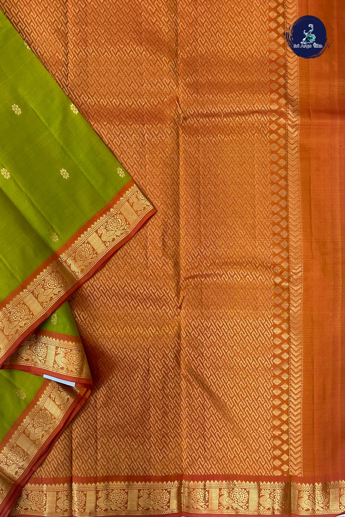 Lime Green Light Weight Silk Saree With Zari Buttas Pattern