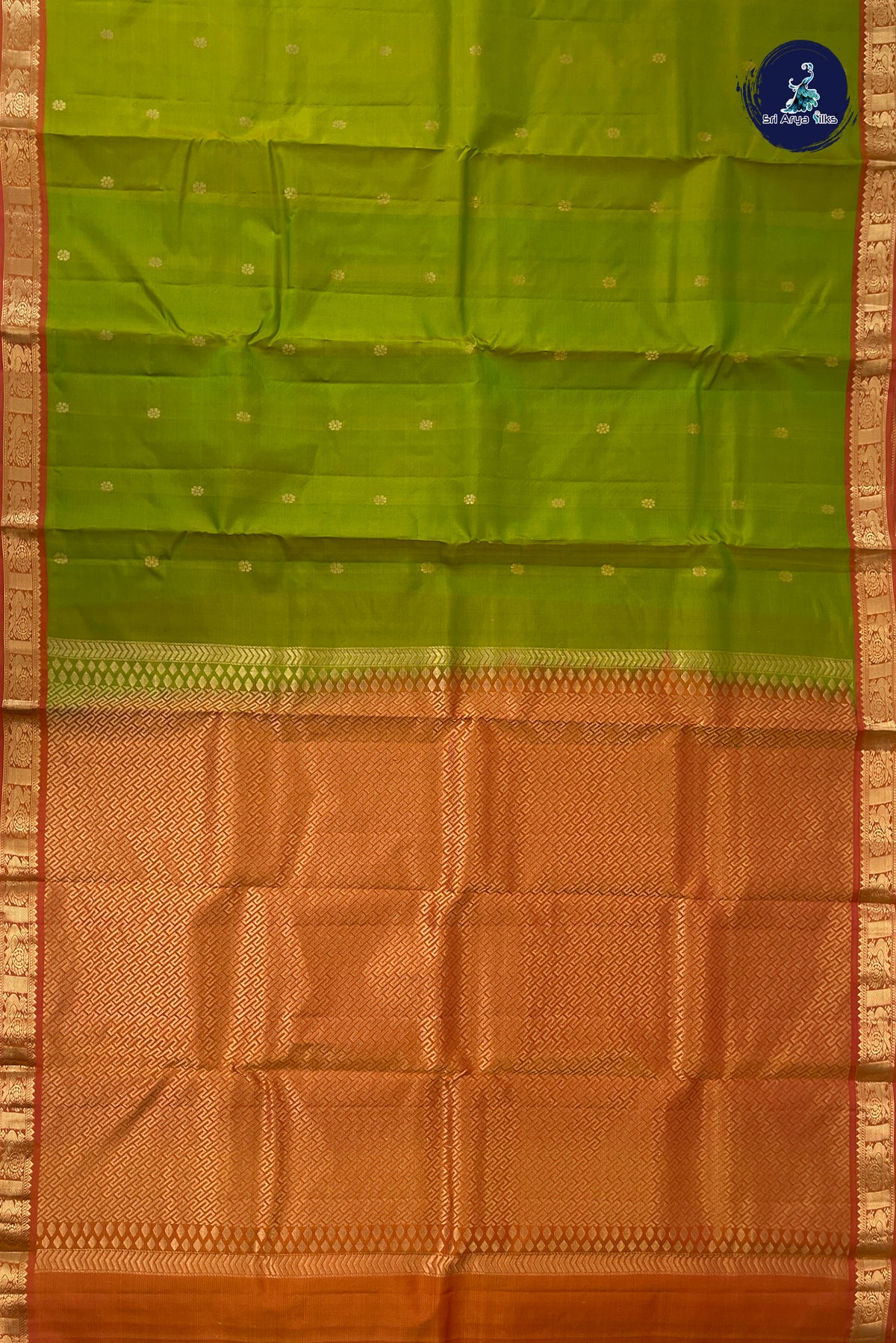 Lime Green Light Weight Silk Saree With Zari Buttas Pattern