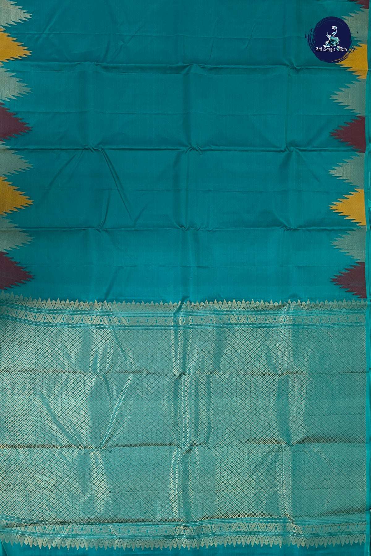 Teal Thalampoo / Temple Border Silk Saree With Plain Pattern