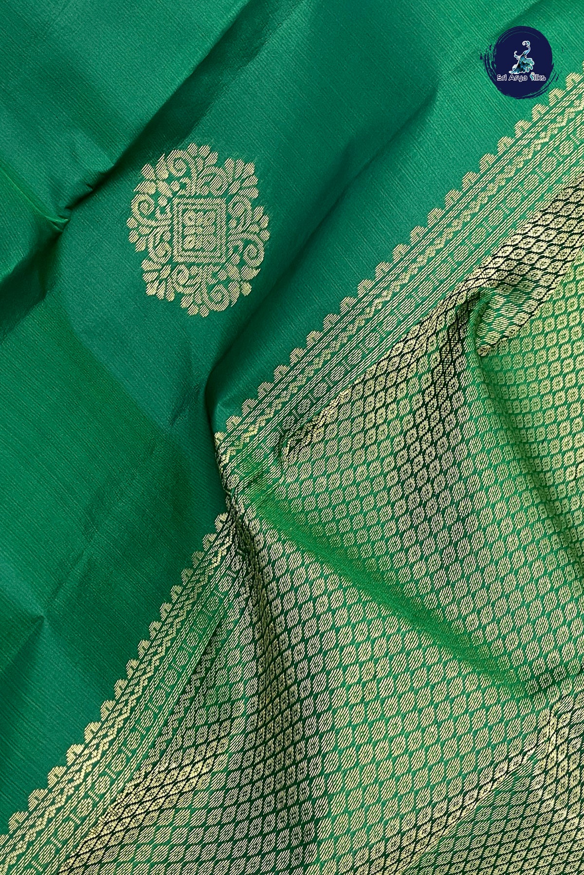 Dark Green Light Weight Silk Saree With Zari Buttas Pattern