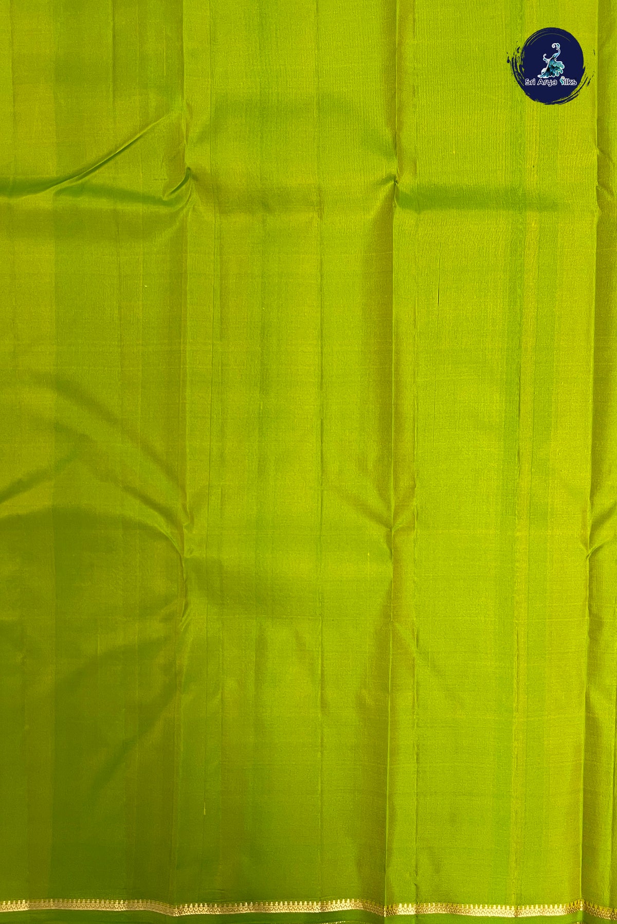 Lime Green Light Weight Silk Saree With Zari Buttas Pattern