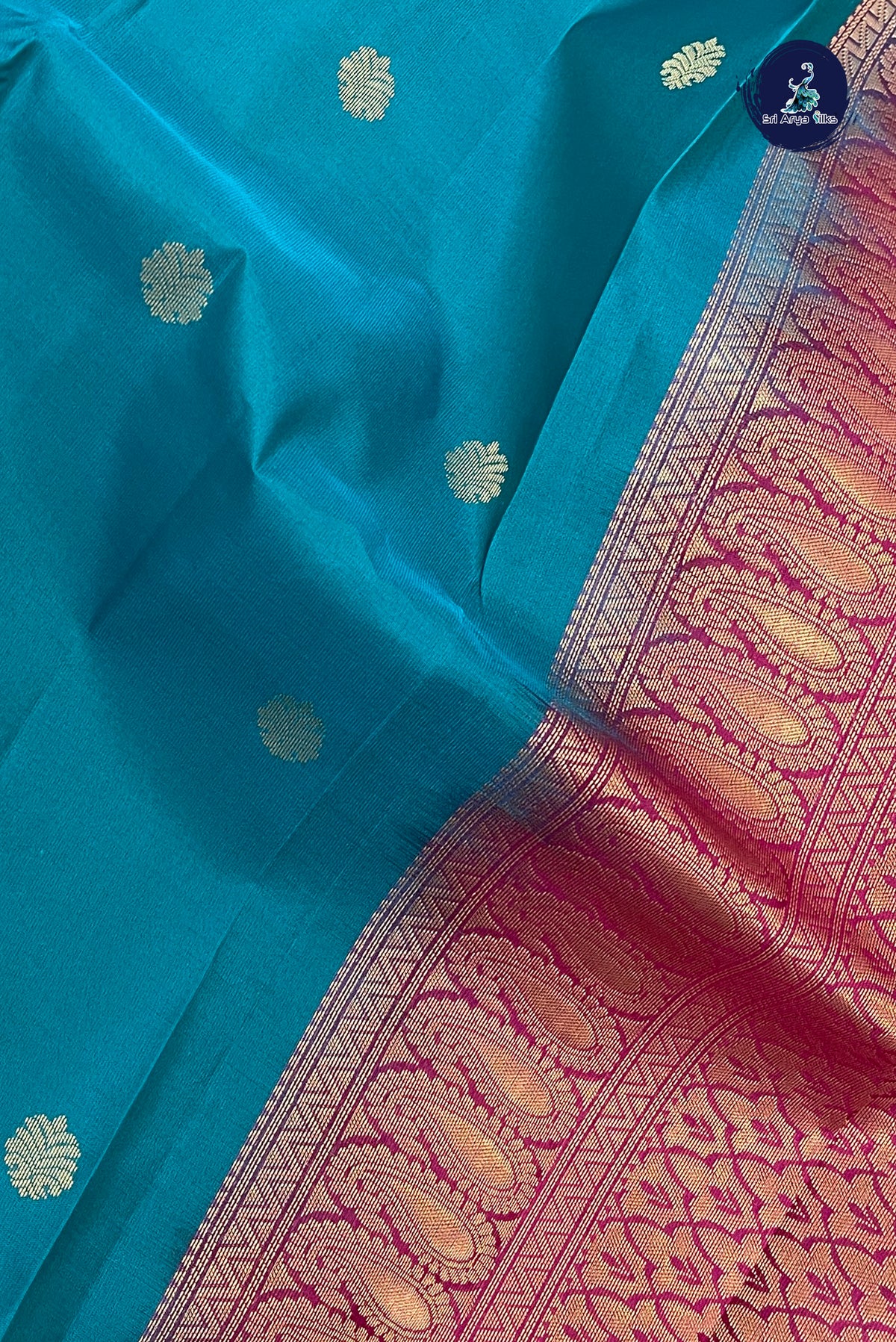 Teal Korvai Contrast Silk Saree With Zari Buttas Pattern